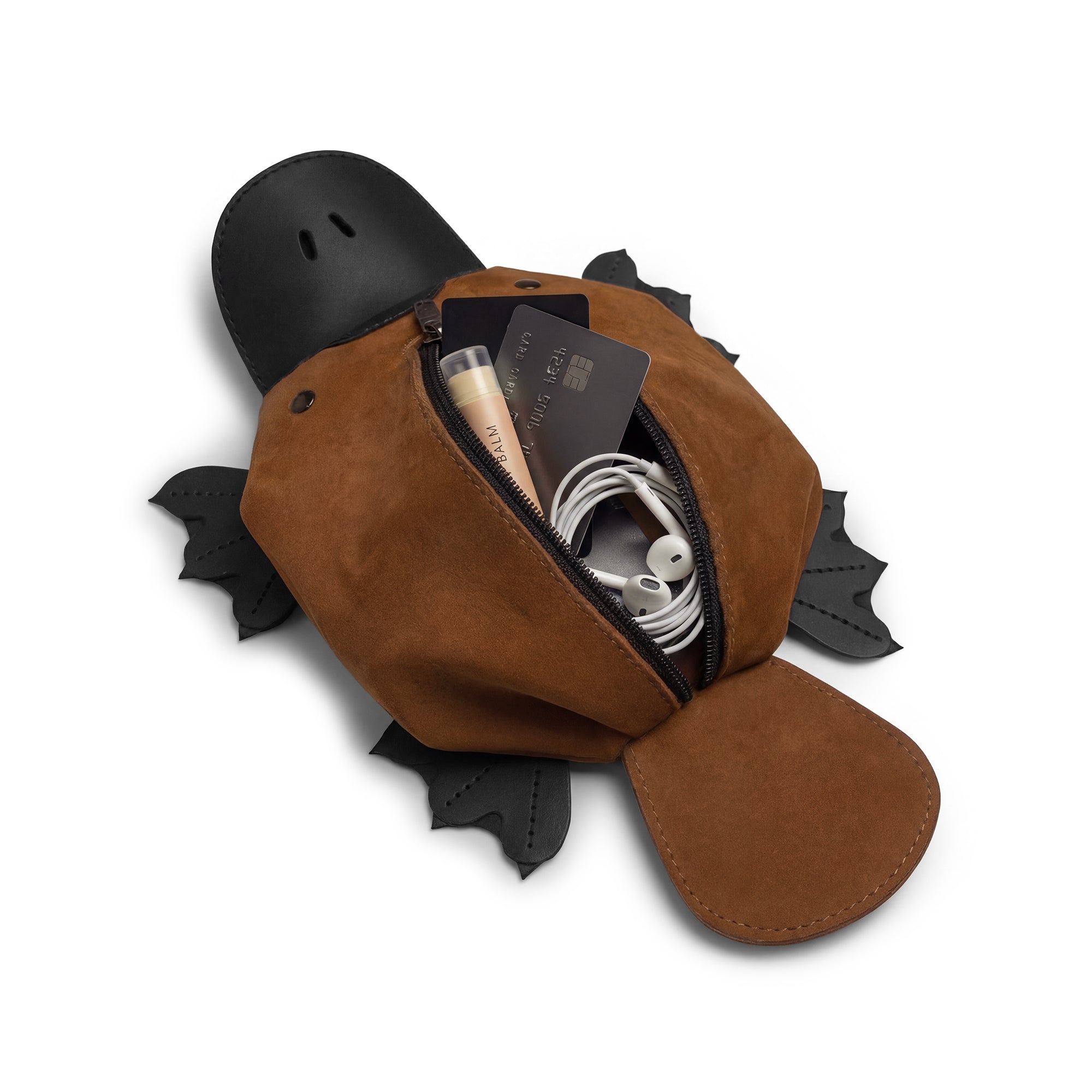 An open view of the Tudi Frudi Leather Platypus Pouch reveals its spacious interior, ideal for organizing essentials like cards and cables. This leather pouch functions as a small coin organizer and zippered cash holder wallet for coins, combining practicality with artisan craftsmanship. Each piece, made from full grain leather, is hand cut and hand sewn in La Antigua Guatemala & Oaxaca Mexico.
