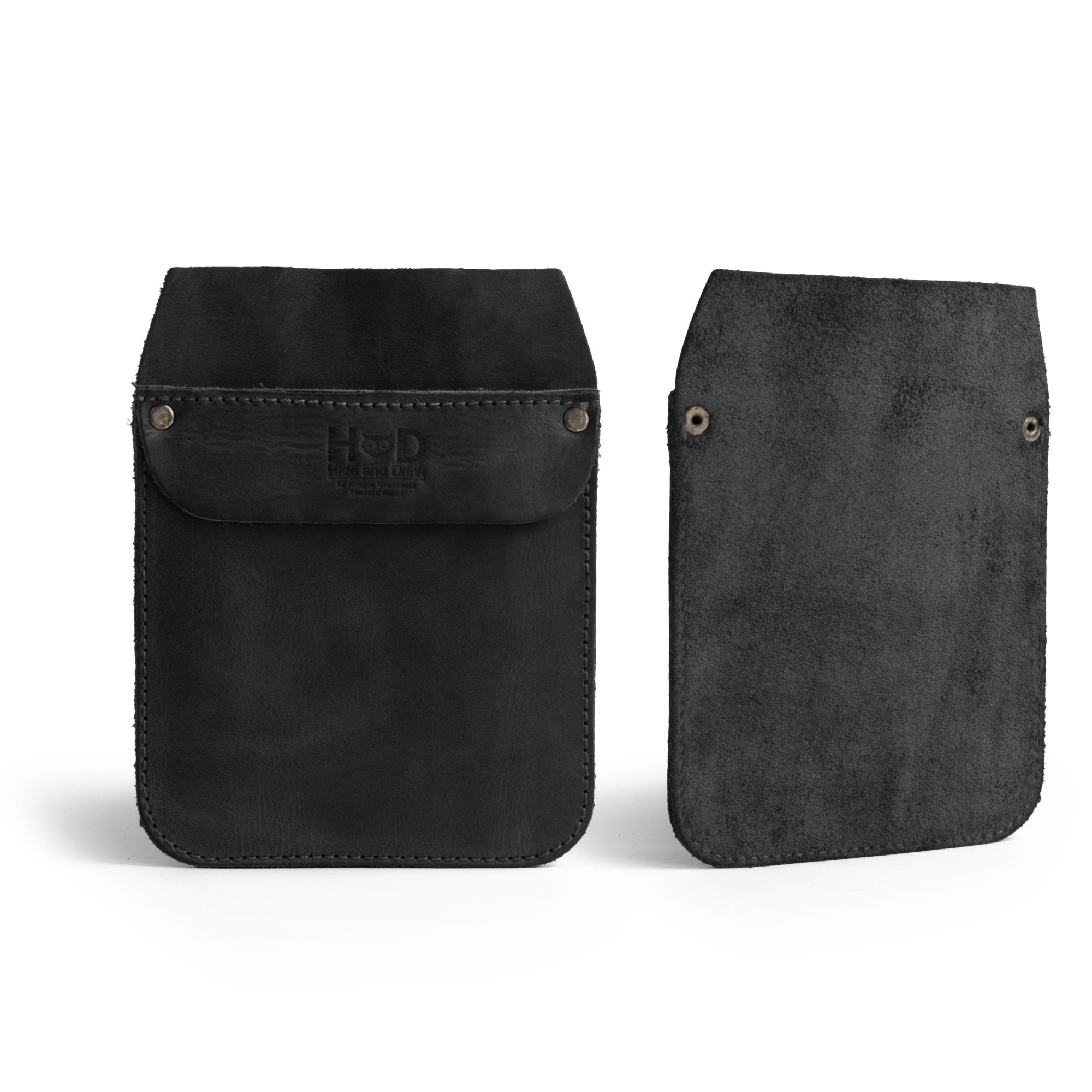 An angled view of the Hide & Drink Leather Work Pocket, highlighting its craftsmanship and sturdy leather material. This stylish Leather Work Pocket is essential for keeping your tools organized and easily accessible.