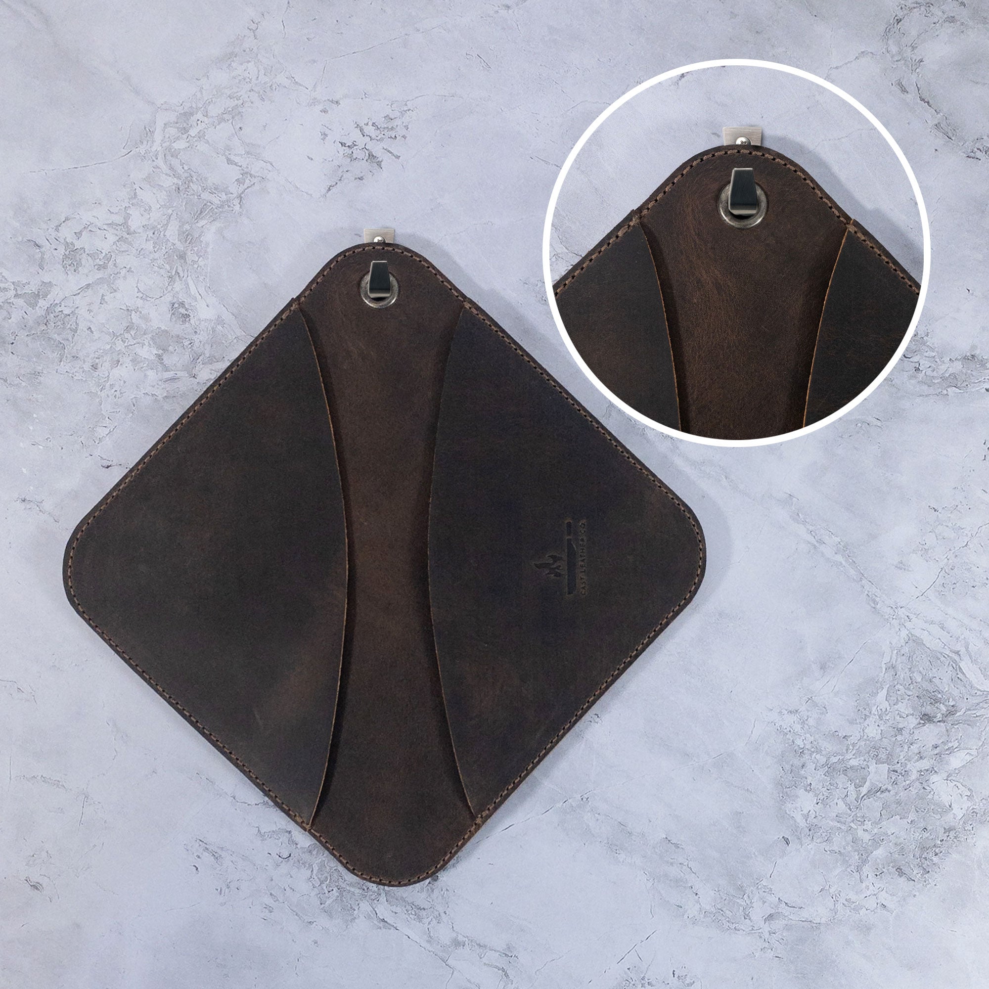 Top view of the Cast Leather Co. Leather Oven Mitt & Trivet, highlighting its unique design and functionality. This squared hot pot pad (potholder) is made of full grain leather, perfect for bakery supplies, featuring elements of small batch production and handcrafted excellence from artisans in La Antigua Guatemala.