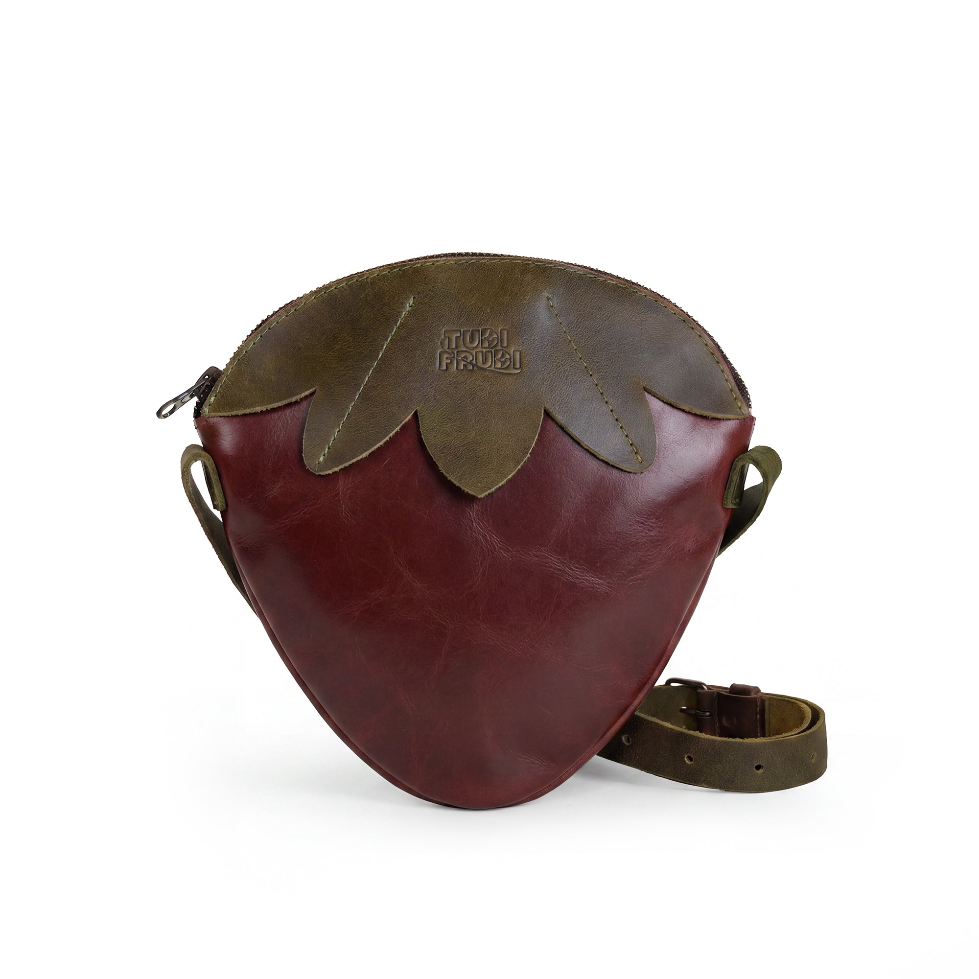 Open view of the Leather Strawberry-Shaped Shoulder Bag by Tudi Frudi, highlighting its zipper closure and spacious interior. This bag made from Full Grain Leather emphasizes the artisanal quality of small batch production, showcasing hand-cut and hand-sewn details, all handmade in La Antigua Guatemala & Oaxaca Mexico.