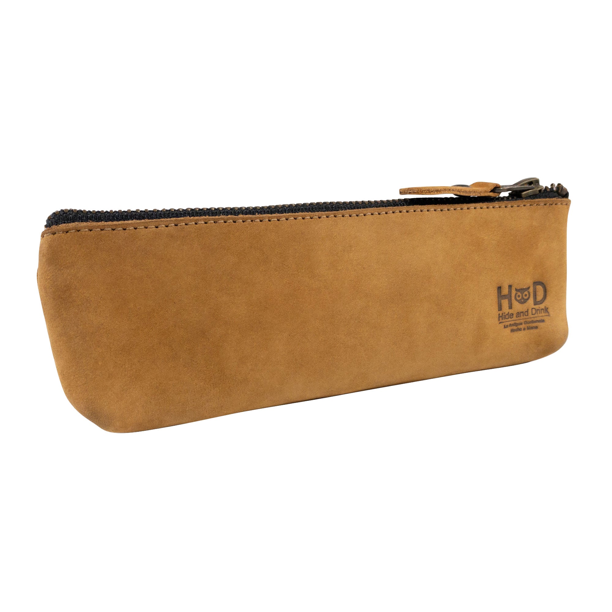 Pencil Pouch by Hide & Drink displayed against a neutral background. This flat zippered holder is a practical rectangular pencil case made from full grain leather, suitable for both men and women. Hand sewn by artisans in La Antigua Guatemala, it’s a classic choice for artists.
