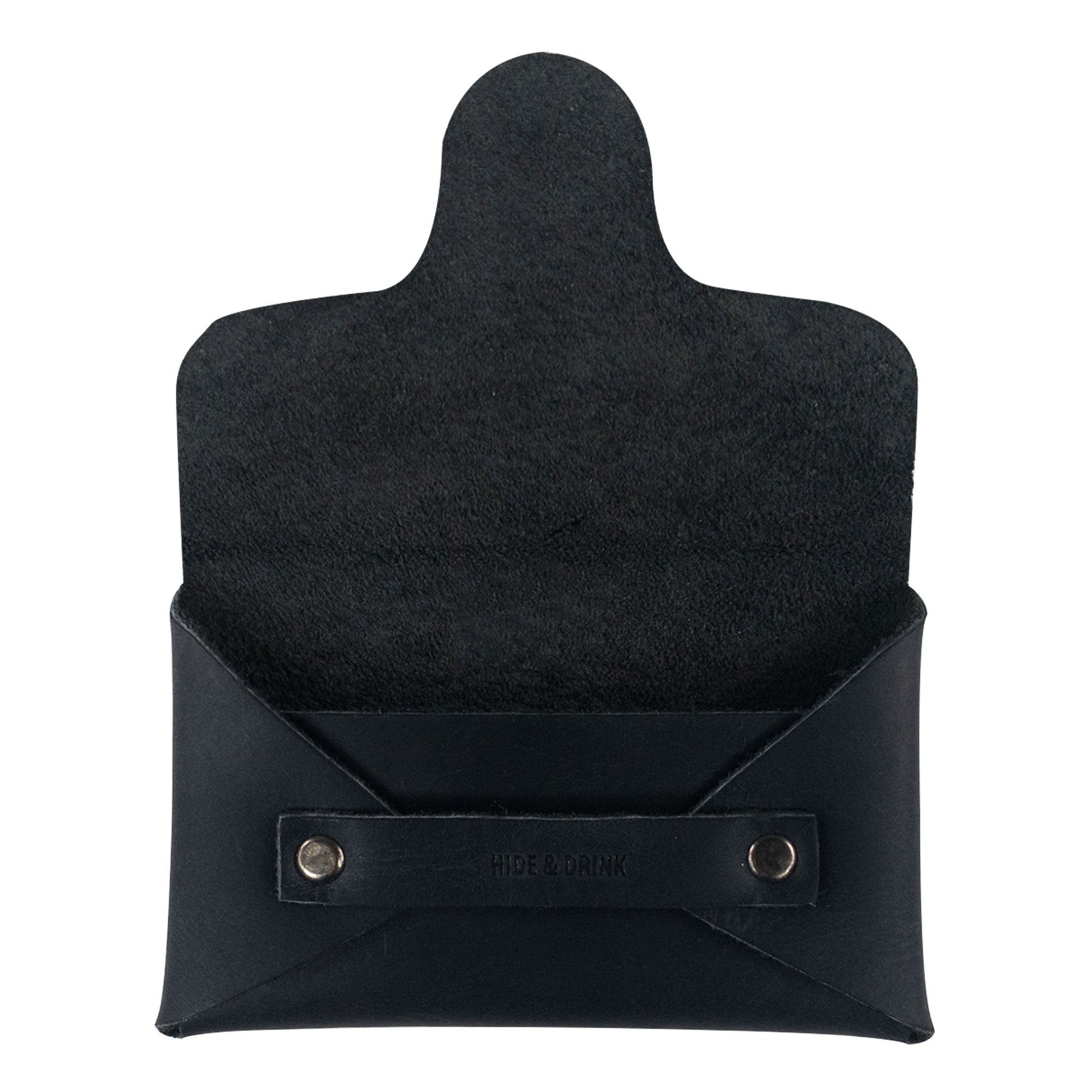 The interior view of a Snapless Business Card Holder by Hide & Drink, showcasing its practical design with a smooth lining. This vintage wallet is perfect for men and women, made from resilient Full Grain Leather, serving as a sturdy pouch and money organizer crafted with care, hand cut and sewn in La Antigua Guatemala and Oaxaca Mexico.