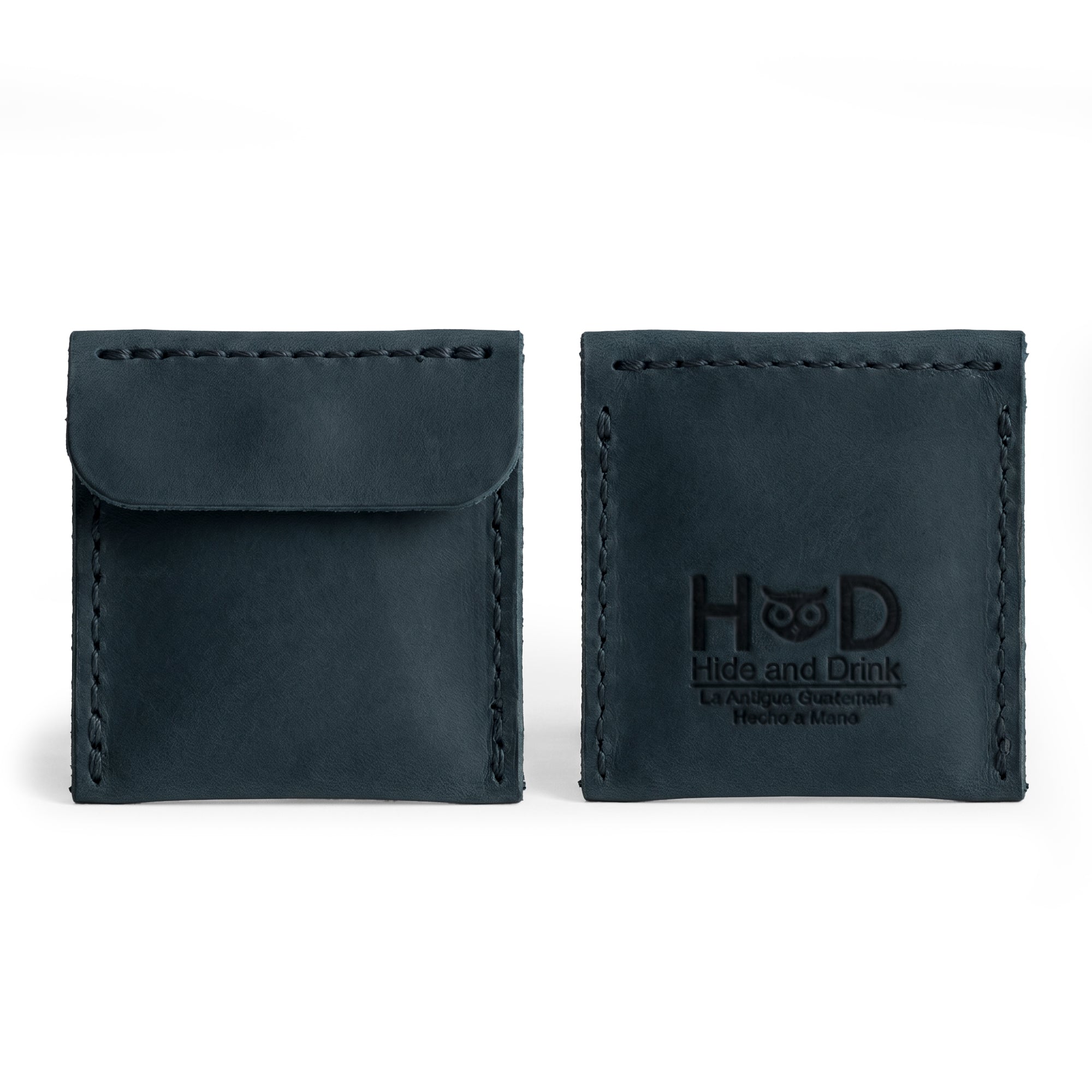 Elegant Hide & Drink Wedding Ring Case in blue, providing an organized way to store engagement rings. This pouch organizer for travel embodies artisan craftsmanship from La Antigua Guatemala & Oaxaca Mexico, hand sewn from full grain leather.