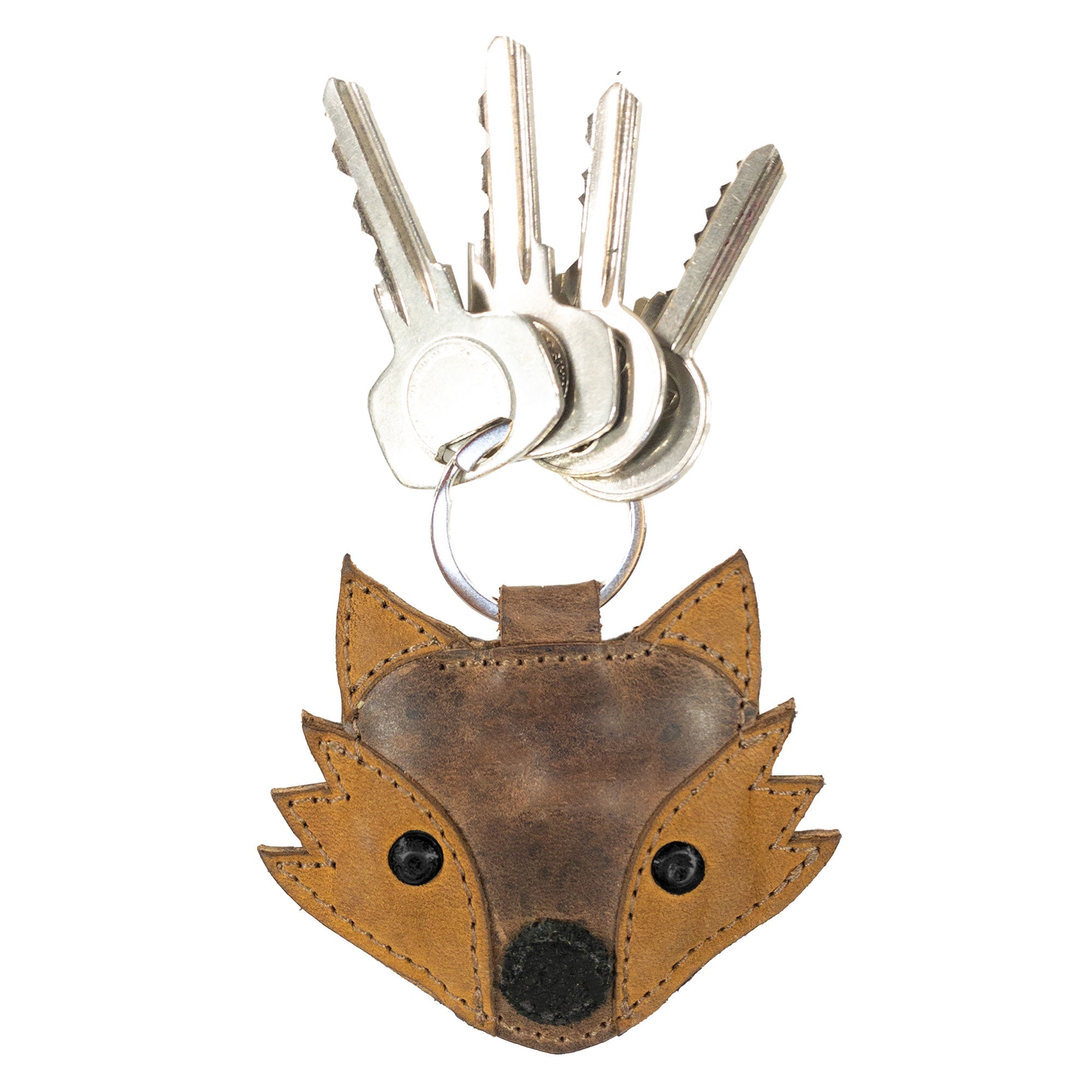Fox Keychain from Hide & Drink displayed with keys attached, showcasing its rustic leather craftsmanship. This stylish key ring is a perfect wildlife accessory made from High Quality Full Grain Leather. Each piece is hand cut and sewn, reflecting the artistry of small batch production from La Antigua Guatemala & Oaxaca Mexico.