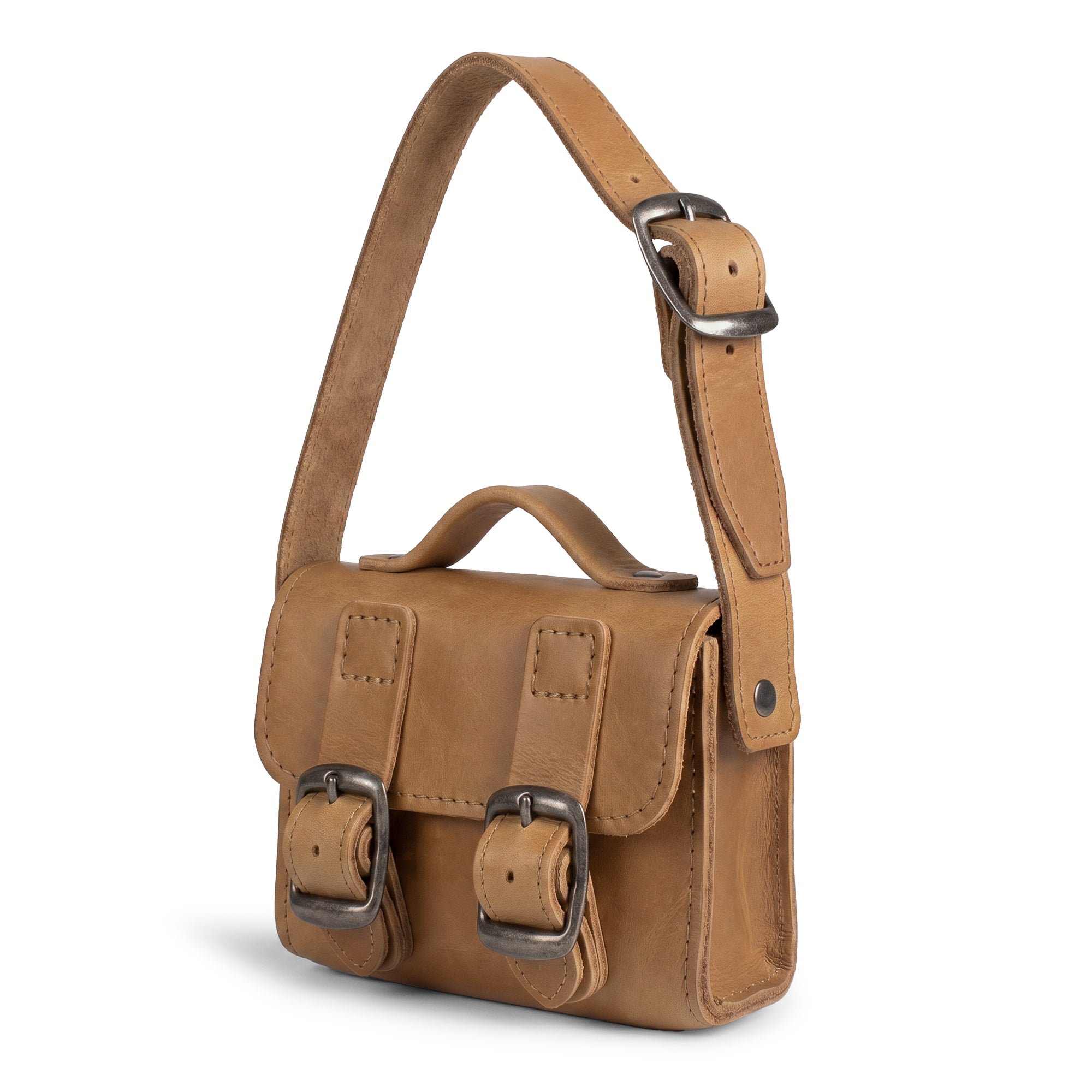 Side view of the tan Tiny Messenger Bag by Hide & Drink, emphasizing its Full Grain Leather craftsmanship. This stylish Mini Messenger Bag Charm is a must-have for your keychain or handbag, beautifully handmade by artisans in La Antigua Guatemala.