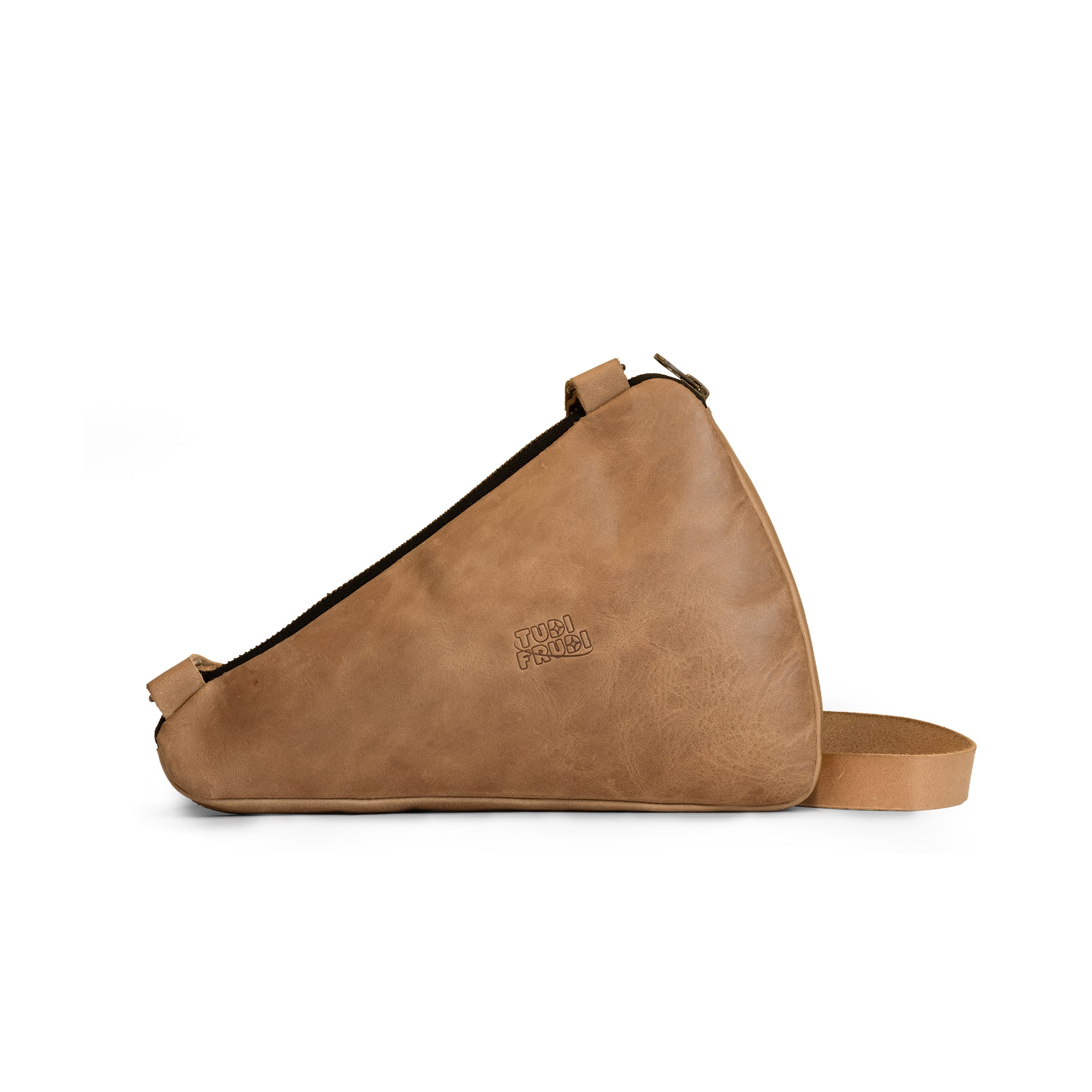 Side view of the Pizza Slice-Shaped Shoulder Bag by Tudi Frudi, showcasing the high-quality Full Grain Leather and adjustable strap. This unique bag is part of small batch production, hand sewn by artisans, making it a trendy crossbody option.