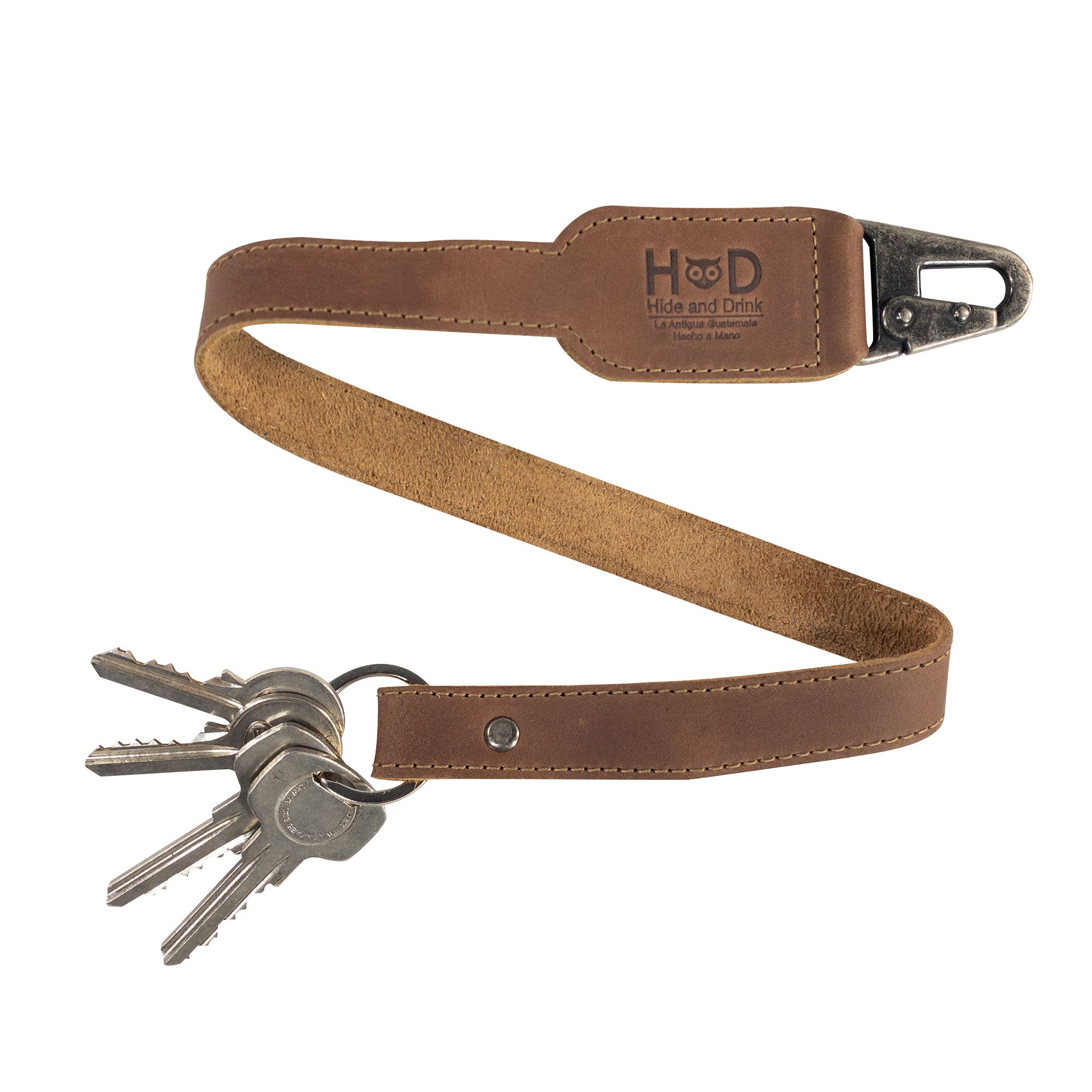 Hide & Drink Keychain Lanyard crafted from premium Full Grain Leather, featuring a convenient clip for keys, demonstrating the principles of small batch artisan production.