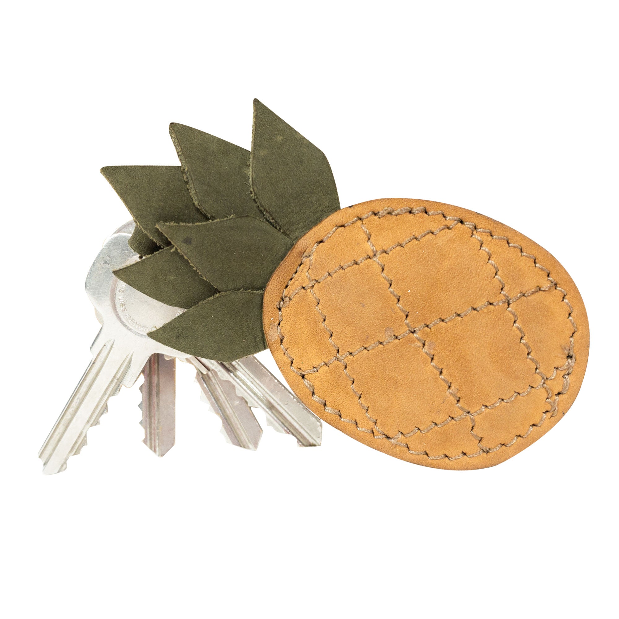 Another angle of the Pineapple Keychain by Hide & Drink, displaying the delightful tropical fruit appearance that adds a playful flair to key rings. Hand cut and hand sewn with love, this accessory is made from fine full grain leather, highlighting the unique artistry of small batch production.