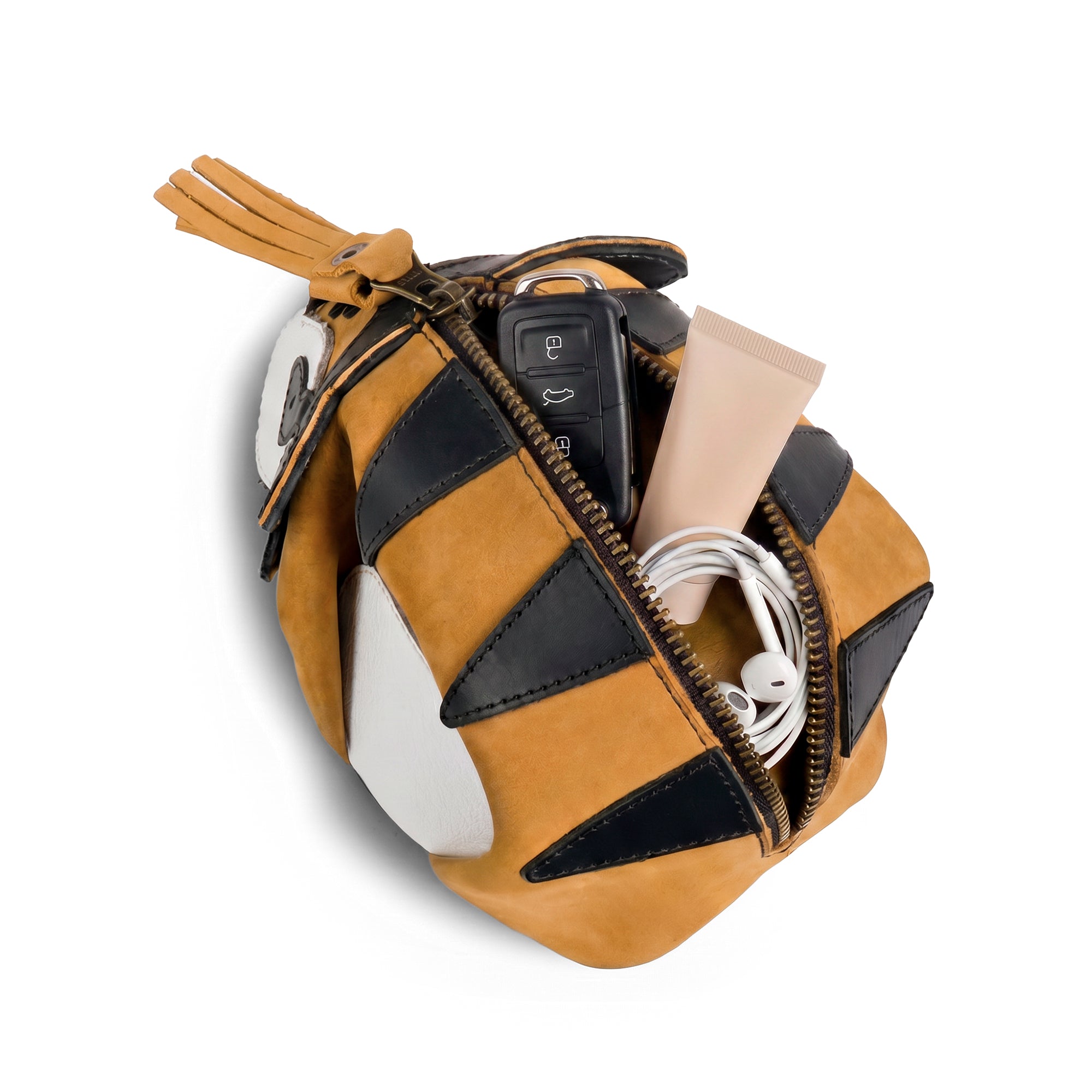 Open Tiger Leather Pouch by Tudi Frudi, demonstrating its versatility as a Leather Coin Purse and Small Charger Cable Holder, made from Full Grain Leather with a zipper, crafted through small batch production, hand cut and hand sewn, ideal for organizing items like cash and cosmetics.