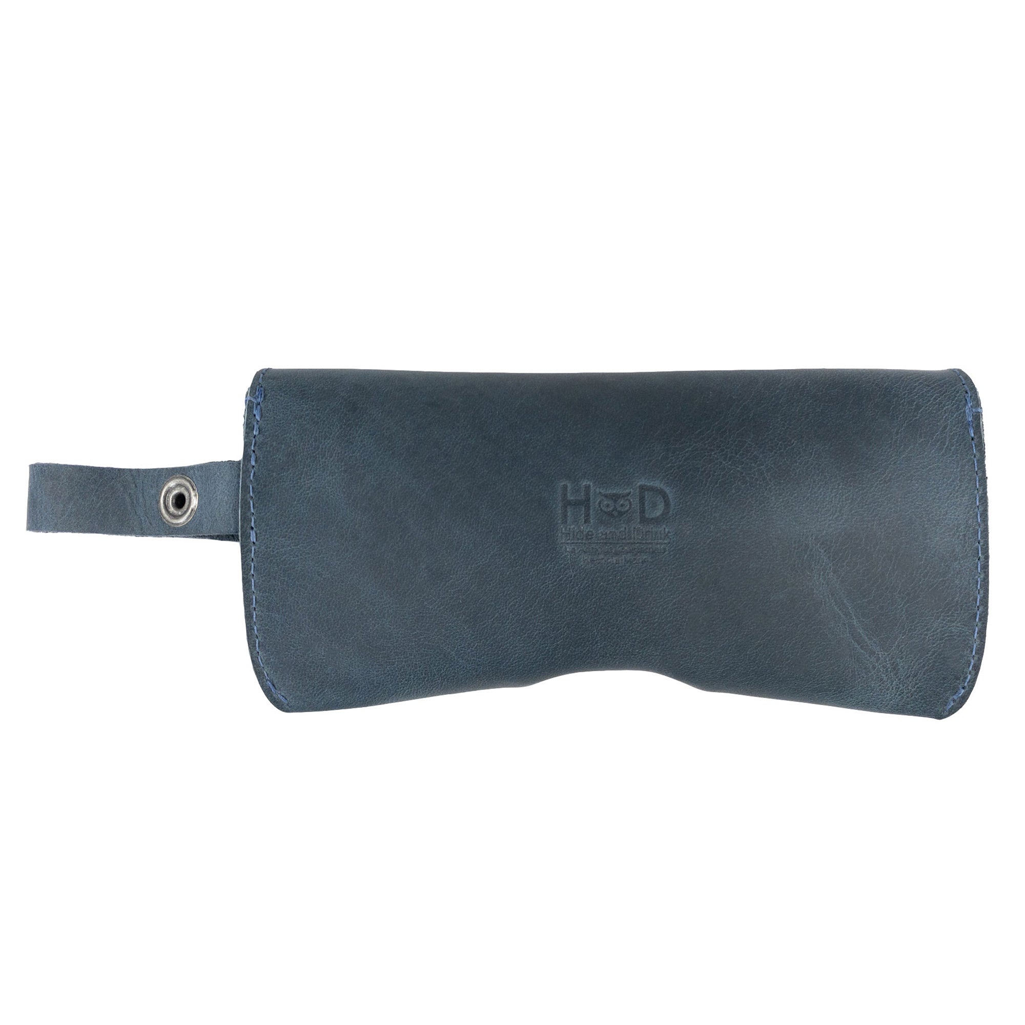 Closed Dark Blue Eyeglasses Case with Strap from Hide & Drink, showcasing its sleek full grain leather construction. This sunglasses case serves as a sturdy protector for eyewear, emphasizing small batch artisan craftsmanship in La Antigua Guatemala & Oaxaca Mexico.