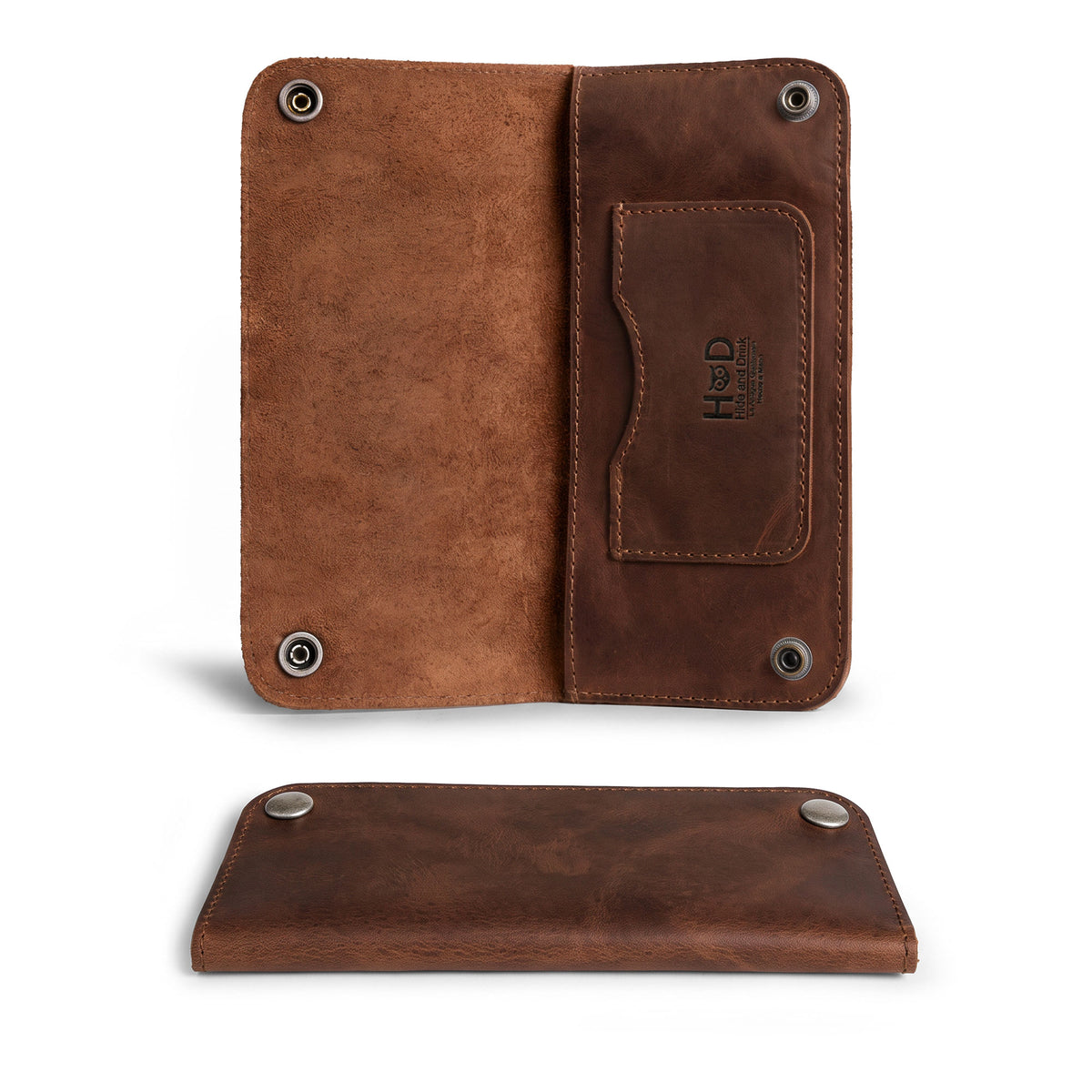 Inside view of the Brown Double Snap Folio Wallet by Hide & Drink, displaying cash and a card in its well-crafted full grain leather design. This rectangular flat bill holder with card slot functions beautifully as a night bag and travel accessory. Handmade in La Antigua Guatemala & Oaxaca Mexico, it reflects small batch production with fire branded quality.