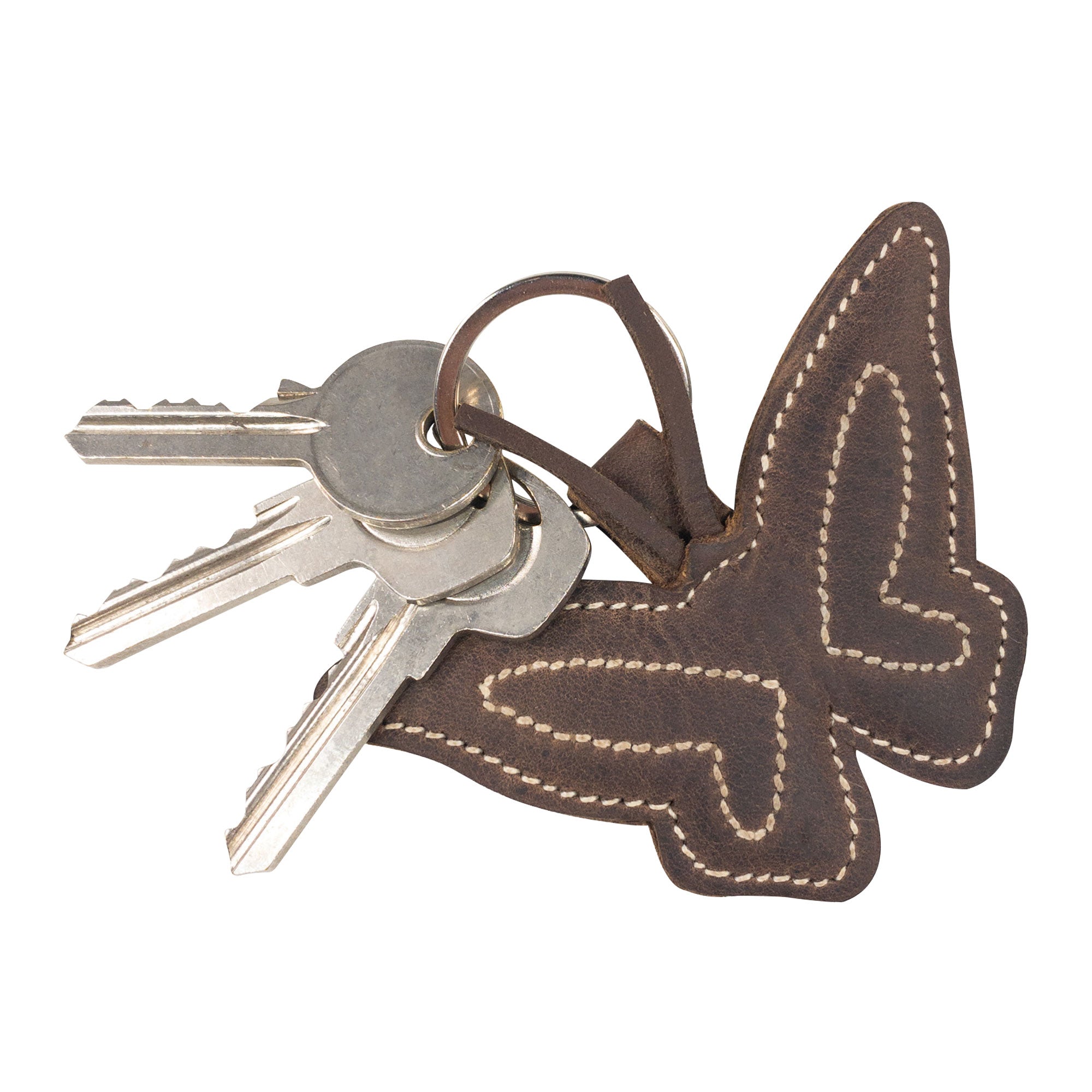 Close-up view of the Butterfly Keychain by Hide & Drink, highlighting its full grain leather texture, making it an ideal key ring for nature lovers. This handcrafted piece embodies the beauty of a flying insect, with attention to detail in small batch production.