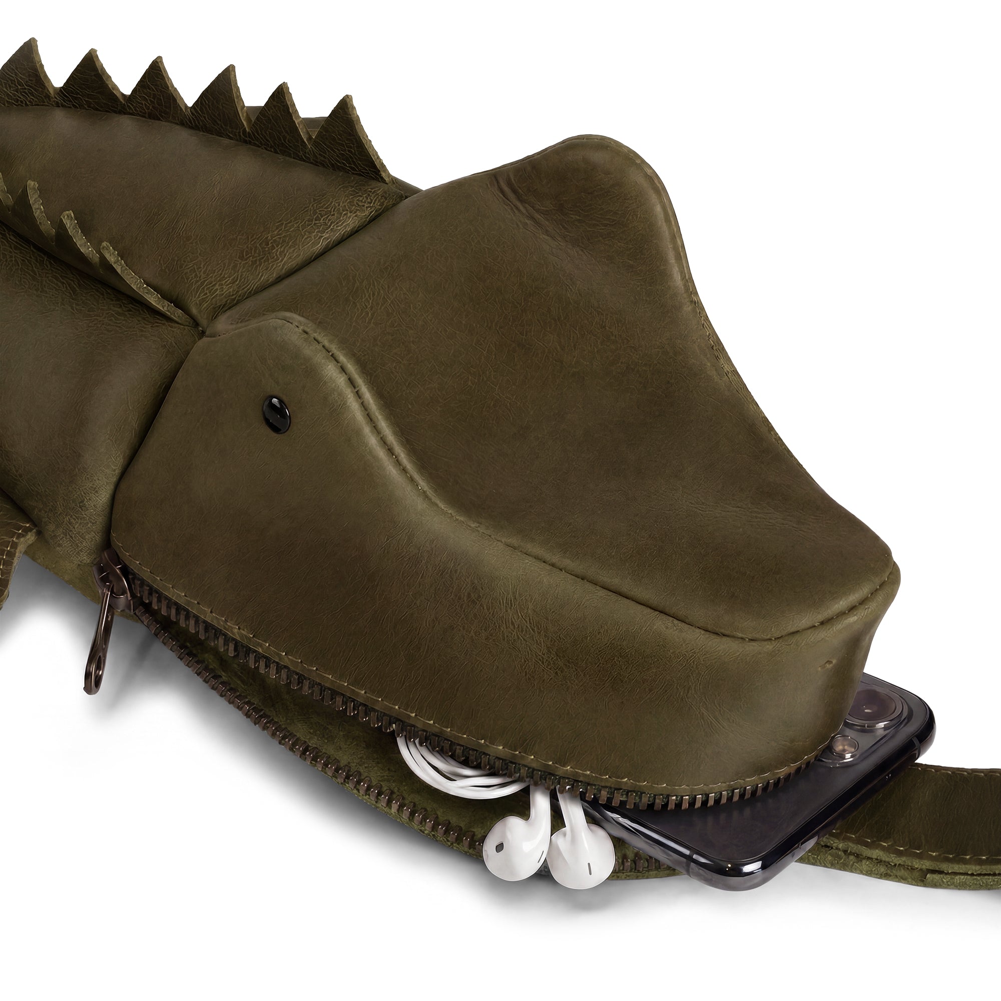 Close-up of the Crocodile-Shaped Crossbody by Tudi Frudi, featuring a Gator-Shaped Sling Bag with Adjustable Strap. This Crossbody Purse combines functionality with style as a Messenger Bag or Shoulder Travel Bag, crafted from Full Grain Leather, showcasing artisan craftsmanship from small batch production, hand cut and hand sewn, and fire branded. Handmade in La Antigua Guatemala.