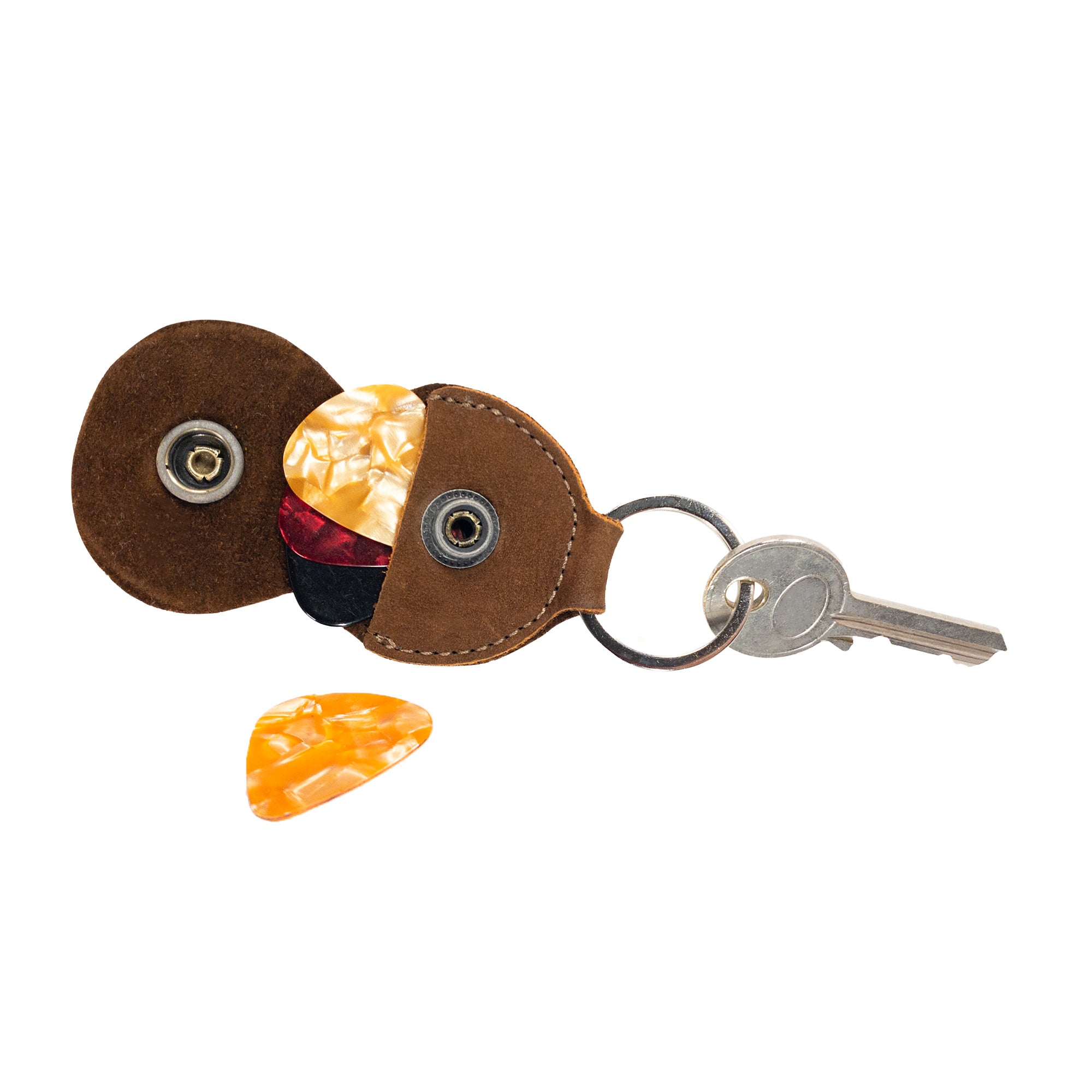 The Key Chain & Guitar Pick Holder by Hide & Drink, featuring an easy-access Guitar Pick Holder with Ring. This key organizer is crafted from premium Full Grain Leather through small batch production, showcasing hand cut and hand sewn durability, artisan details, and fire branded design from La Antigua Guatemala & Oaxaca Mexico.