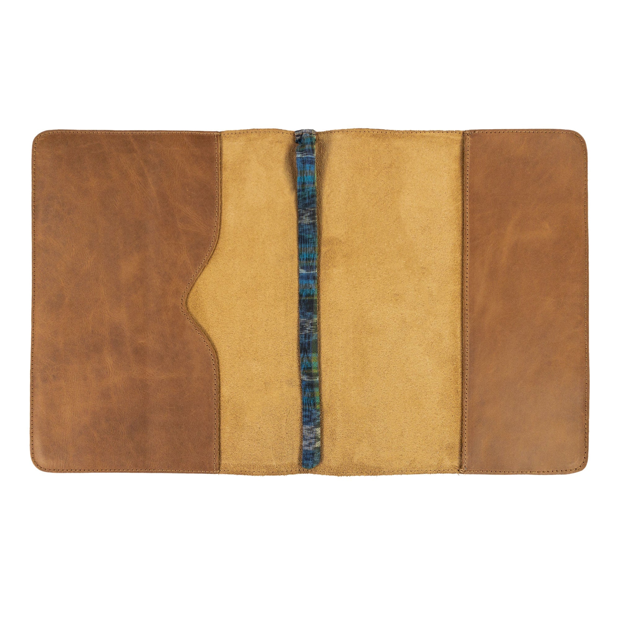 The Journal Cover for (8.5 x 11 in.) Moleskine Cahier XXL by Hide & Drink, showcased in a casual display to emphasize its elegant lines and durable leather material. Perfect for those who appreciate handcrafted artisan products, made in La Antigua Guatemala & Oaxaca Mexico.