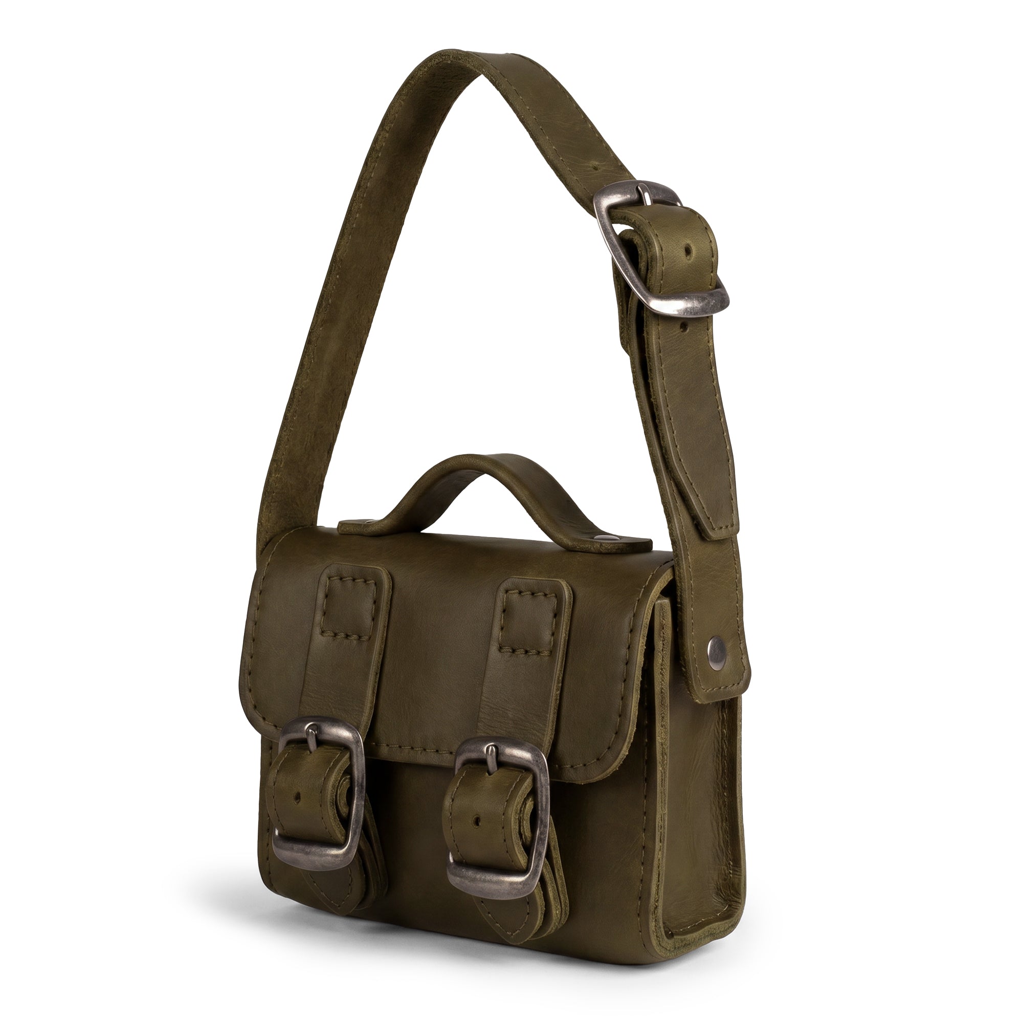 Side view of the green Tiny Messenger Bag by Hide & Drink, spotlighting its Fuller Grain Leather quality. This Mini Messenger Bag Charm is a stylish keychain or a charming addition to handbags, highlighting artisan production in La Antigua Guatemala.