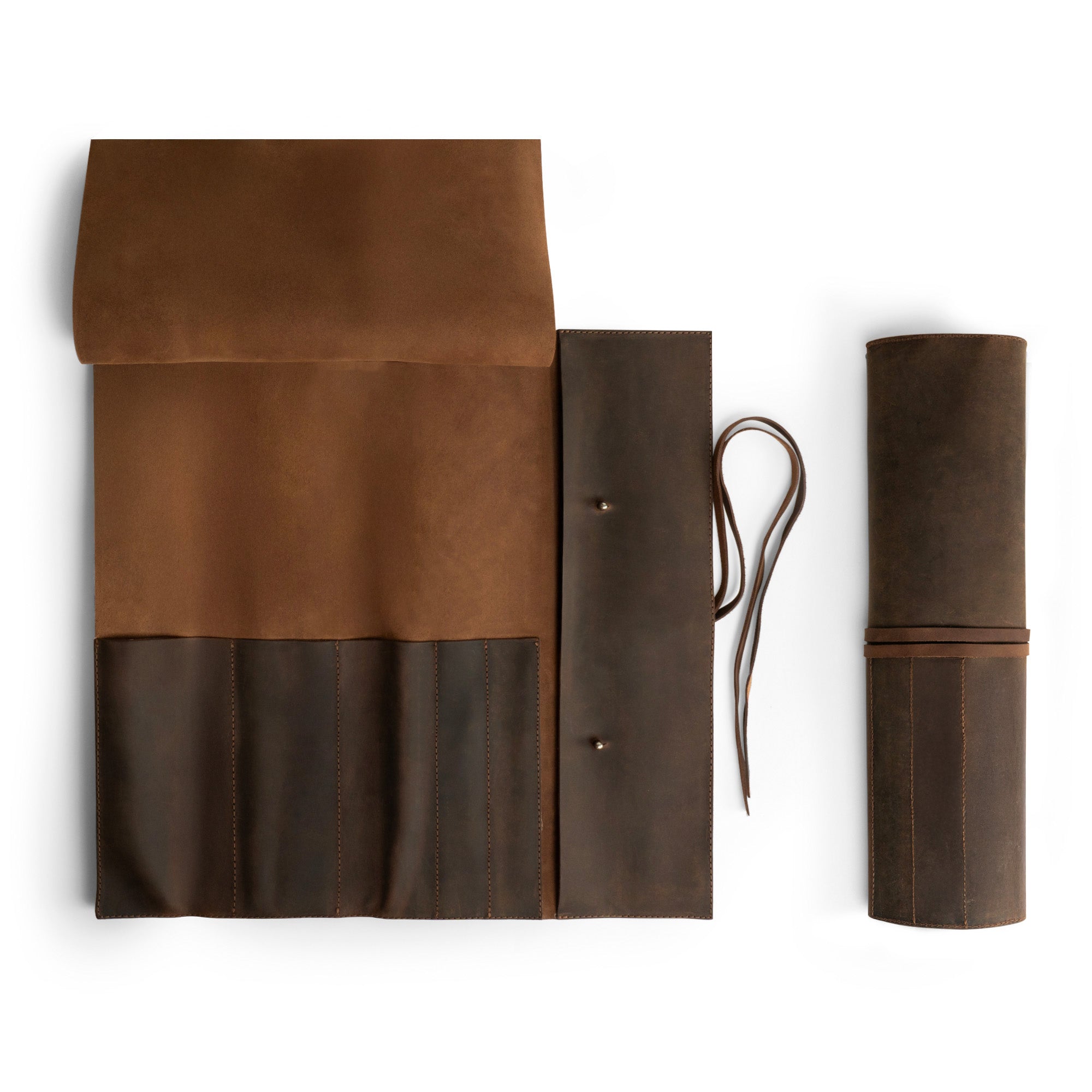 Hide & Drink Knife Roll (5 Pockets) showcasing a spacious interior made of Full Grain Leather, ideal for chefs. This Chef Knife Bag serves as a portable carrying case for knives, highlighting handmade quality with artisan touches from small batch production, hand cut, and hand sewn components.