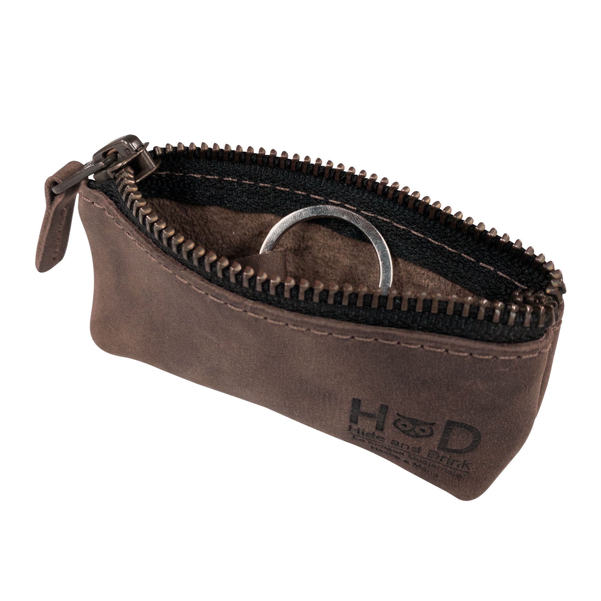 Hide & Drink Key Holder Zippered Pouch featuring an open view to organize keys or memory cards. Vintage style and designed to serve as a charging cable holder, beautifully crafted in full grain leather.