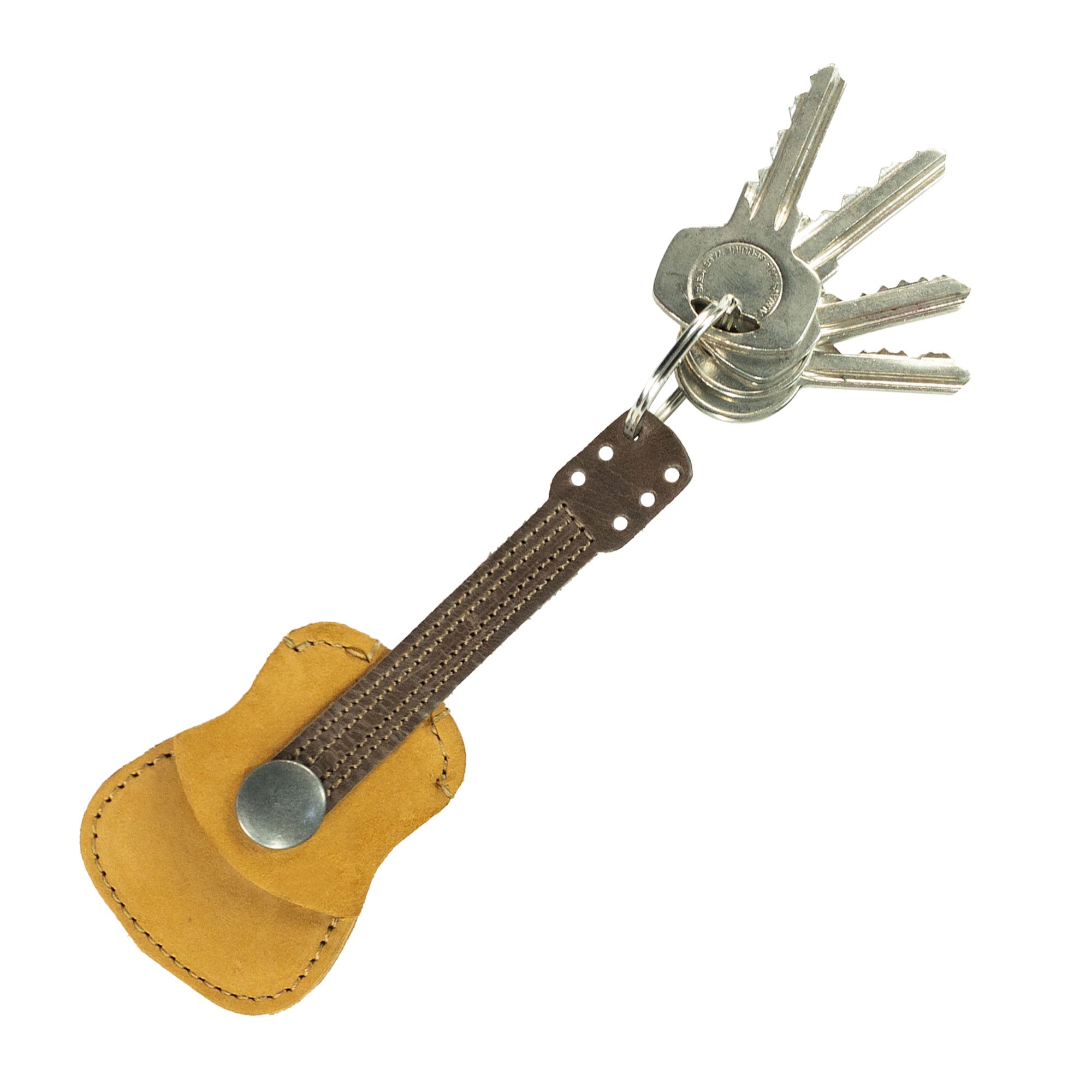 Close-up of Hide & Drink Guitar Pick Holder designed as a Leather Guitar Pick Holder Keychain, made from durable full grain leather. It's a great picks case instrument gift idea for musicians, handcrafted and fire branded in La Antigua Guatemala.