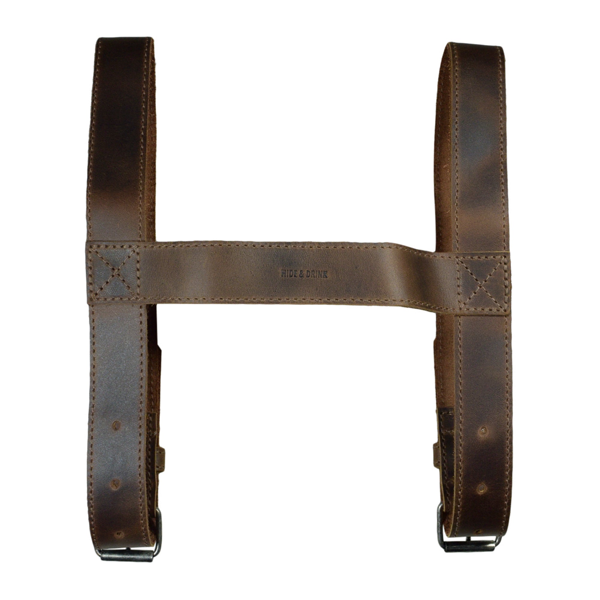 Hide & Drink's Blanket Carrier, a practical travel accessory crafted from Full Grain Leather, features adjustable carry straps, highlighting the small batch production and artisan craftsmanship from La Antigua Guatemala & Oaxaca Mexico.