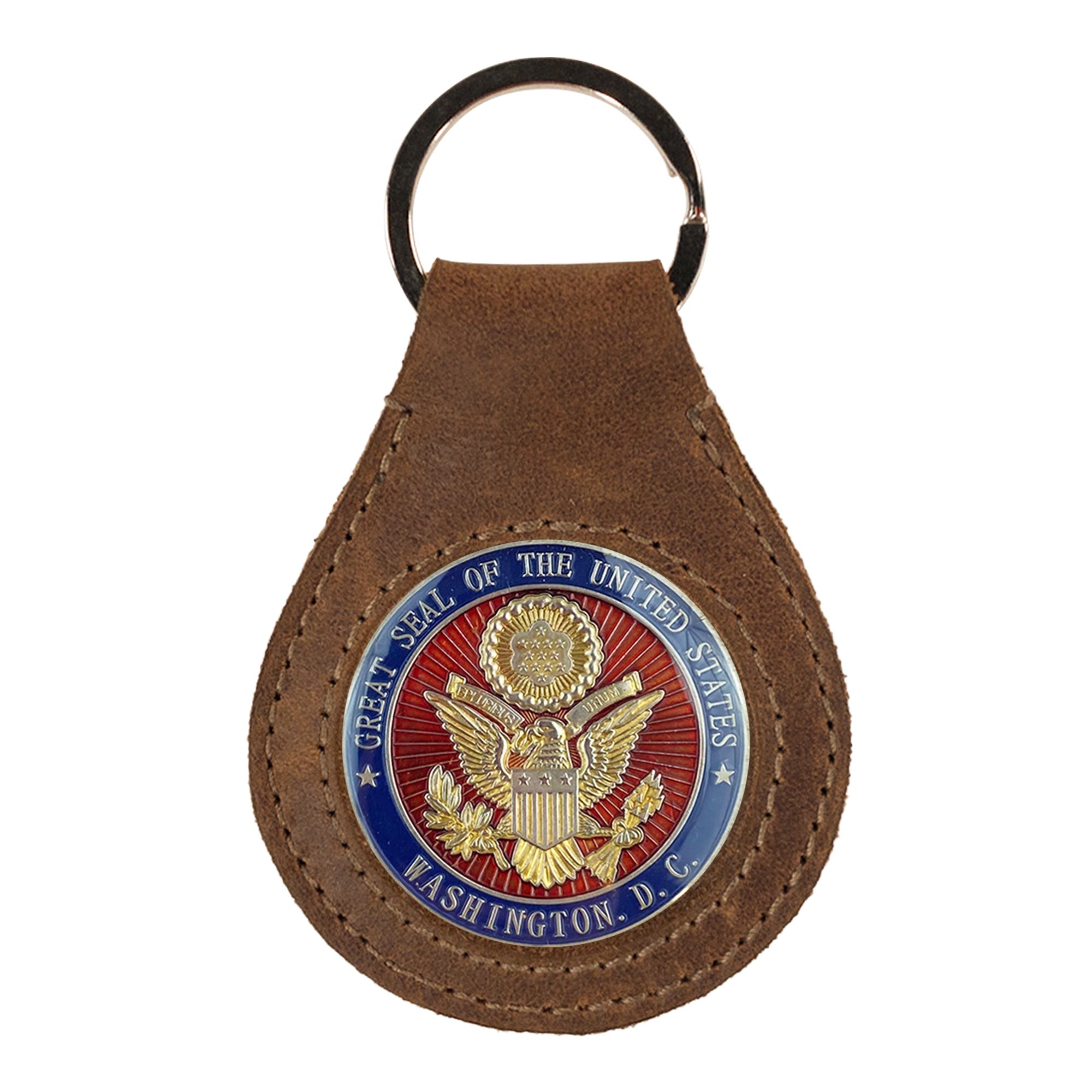Showcasing the Medallion Holder Keychain by Hide & Drink with the U.S. Great Seal, emphasizing its secure keyring attachment for storing special coins and memorabilia. This artisan product is made from quality full grain leather, emphasizing the small batch production and handmade nature from La Antigua Guatemala & Oaxaca Mexico.