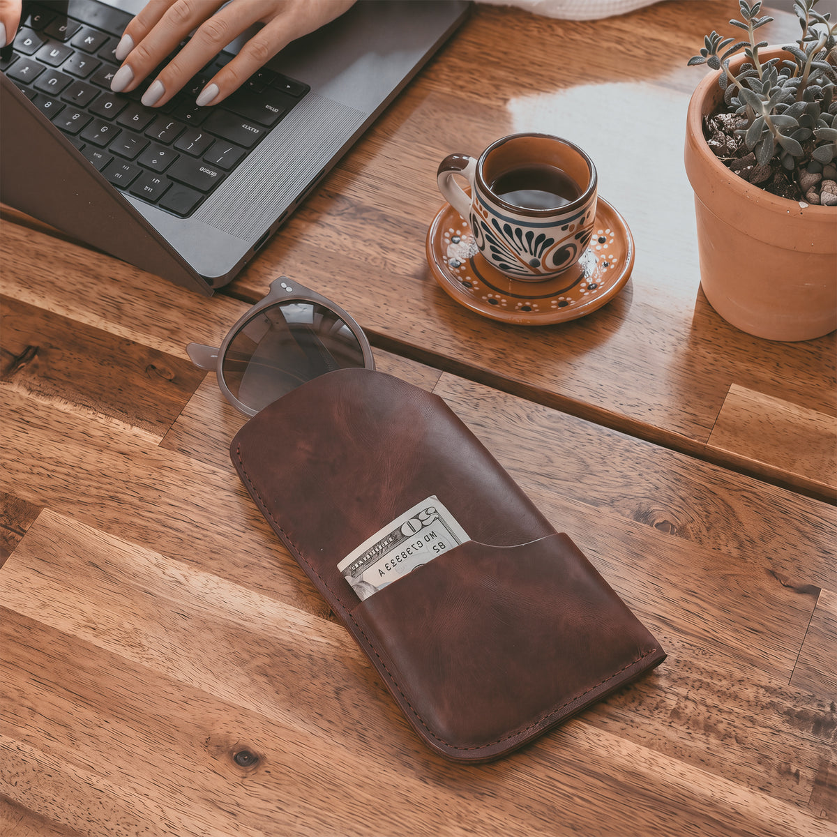The Hide & Drink Sunglass Case & Wallet showcased elegantly in tan leather. This Rustic Sunglasses Case & Wallet combines Full Grain Leather quality with practical design, perfect as a glasses protector for travel, artisanally made in La Antigua Guatemala & Oaxaca Mexico.