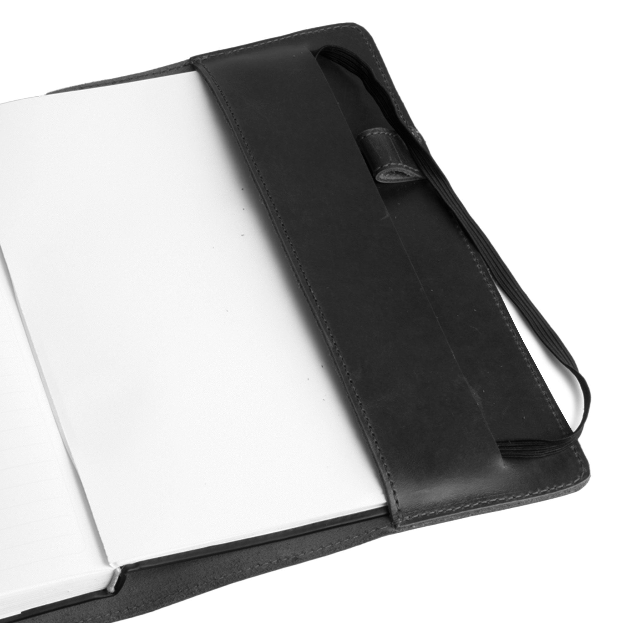 Stylish interior view of the black Leuchtturm A5 Hardcover Case by Hide & Drink, detailing the pen holder and stitching. This Case for Hardcover Leuchtturm A5 (5.75 x 8.25 in.) Notebook offers a protective cover for your journal, crafted from premium full grain leather. StockyardX, Small Batch Production, Hand Cut, Hand Sewn, Fire Branded, Artisan, Handmade in La Antigua Guatemala & Oaxaca Mexico.