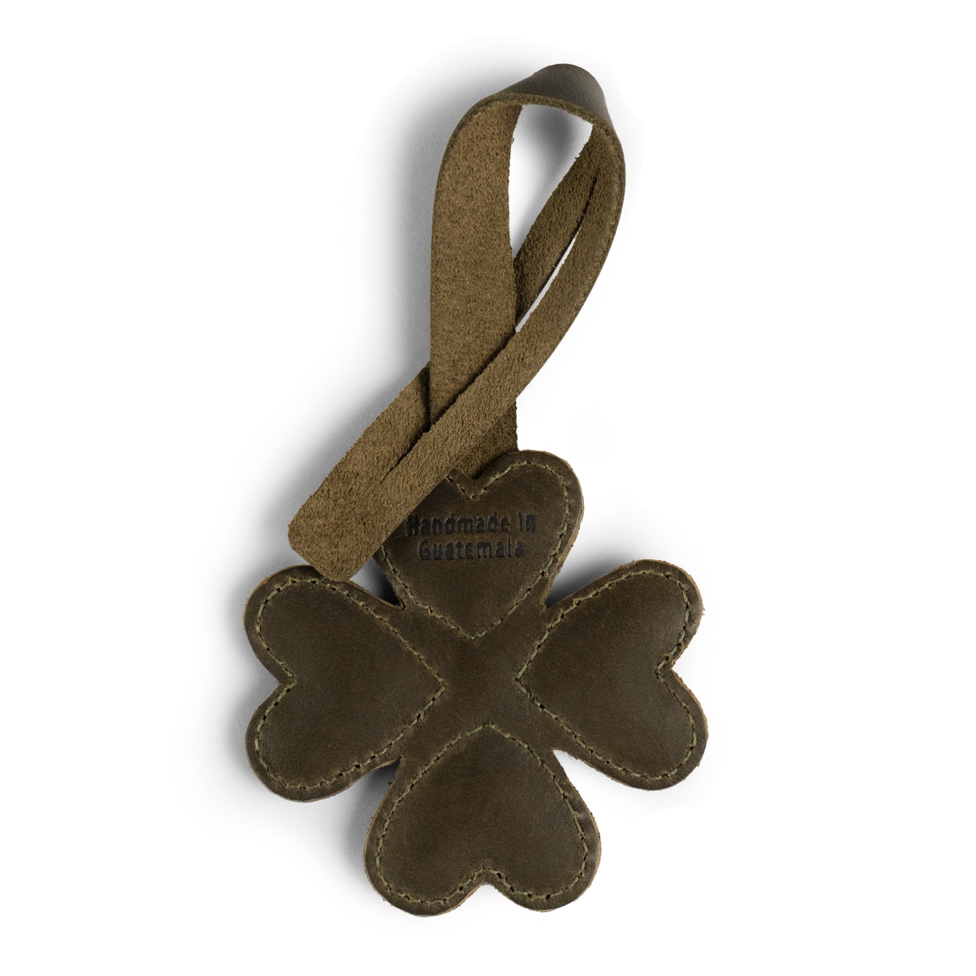 Reverse view of the Hide & Drink Clover Bag Charm, showcasing its unique handmade craftsmanship in full grain leather. This purse charm is ideal for handbags, totes, and backpacks, reflecting the artisan quality with small batch production techniques from La Antigua Guatemala & Oaxaca Mexico.