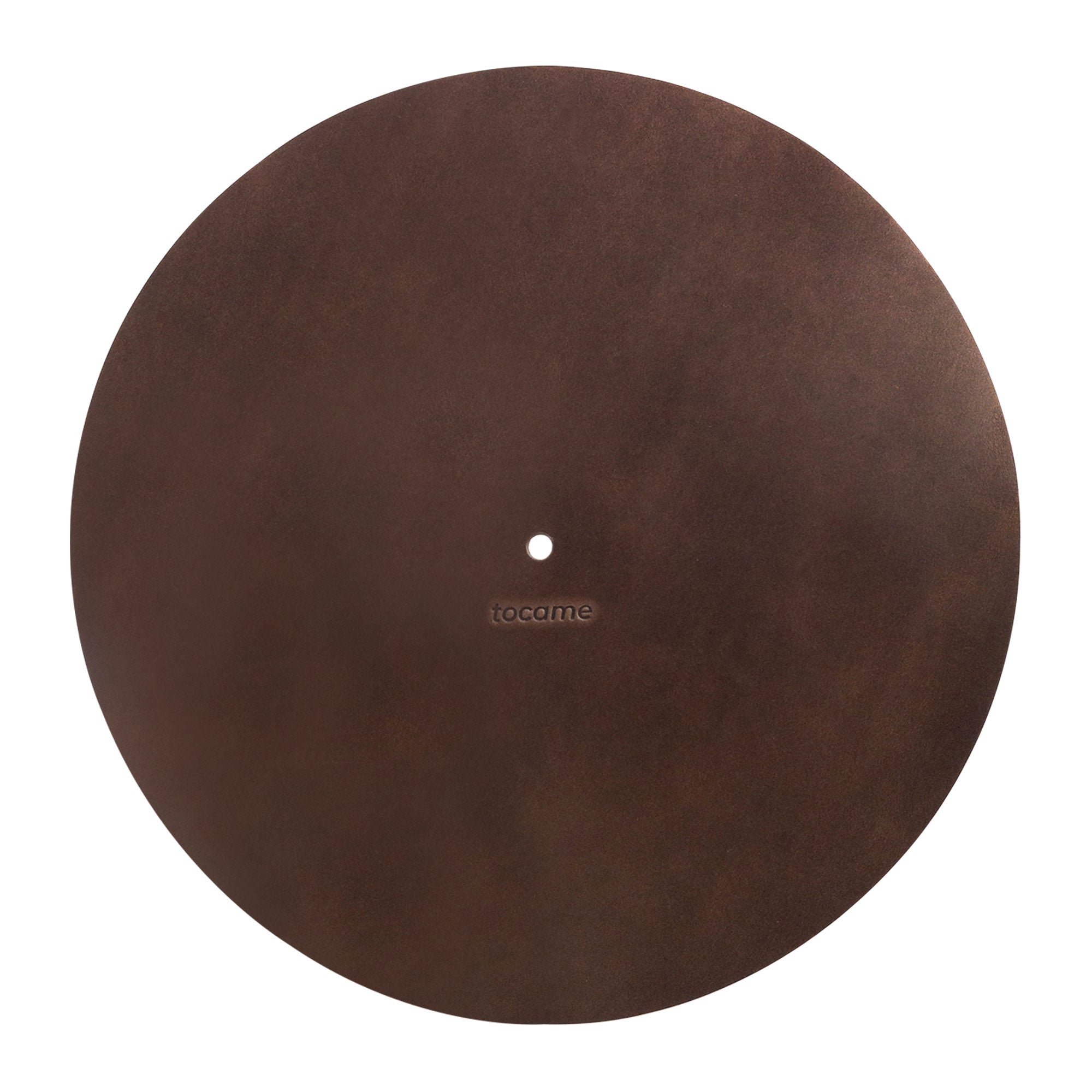 Flat lay of the tocame Circular Turntable Slipmat, highlighting its luxurious full grain leather material. This antistatic cover is perfect for reducing static and dust noise. A hallmark of small batch production and artisan craftsmanship from La Antigua Guatemala.