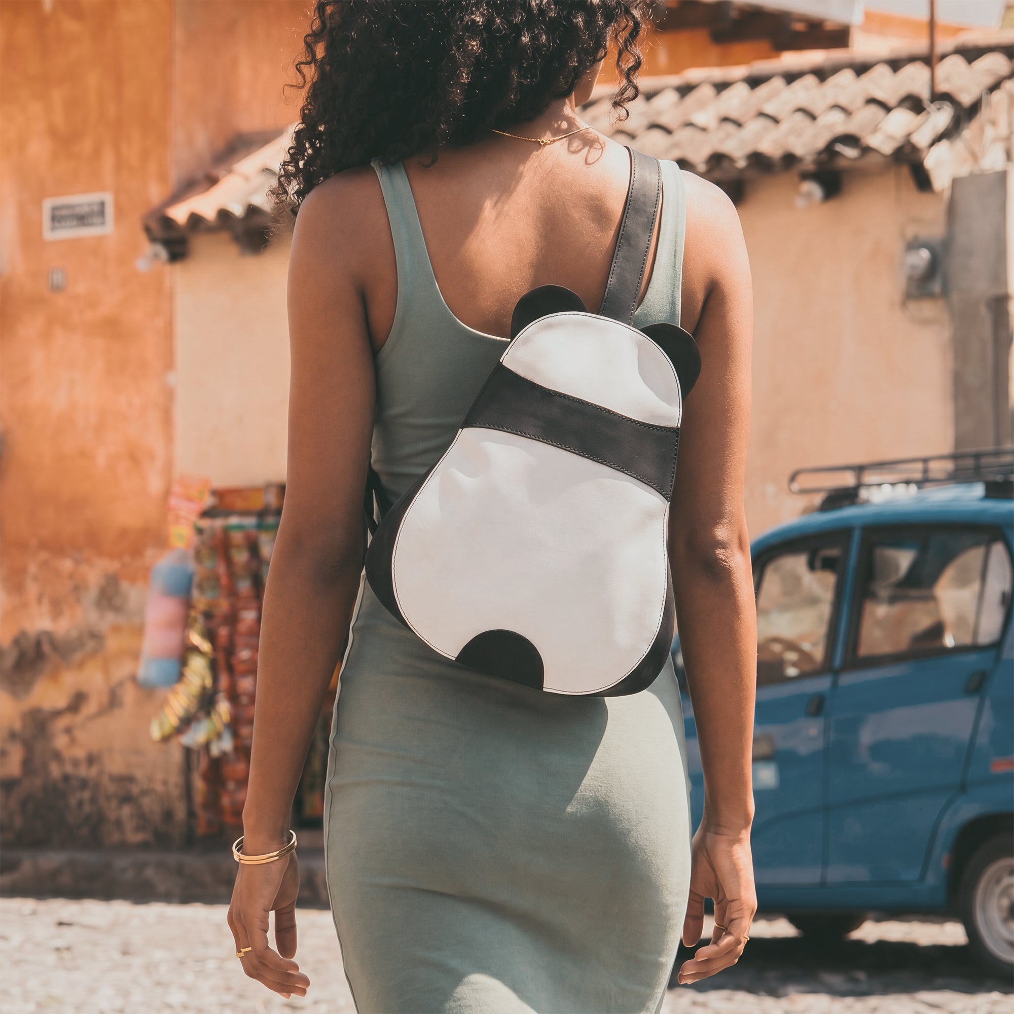 Open view of the Panda-Shaped Crossbody Bag by Hide & Play, revealing ample storage space. This full grain leather bag is a comfortable and functional accessory, showcasing the artisan quality and small batch production from La Antigua Guatemala & Oaxaca Mexico.