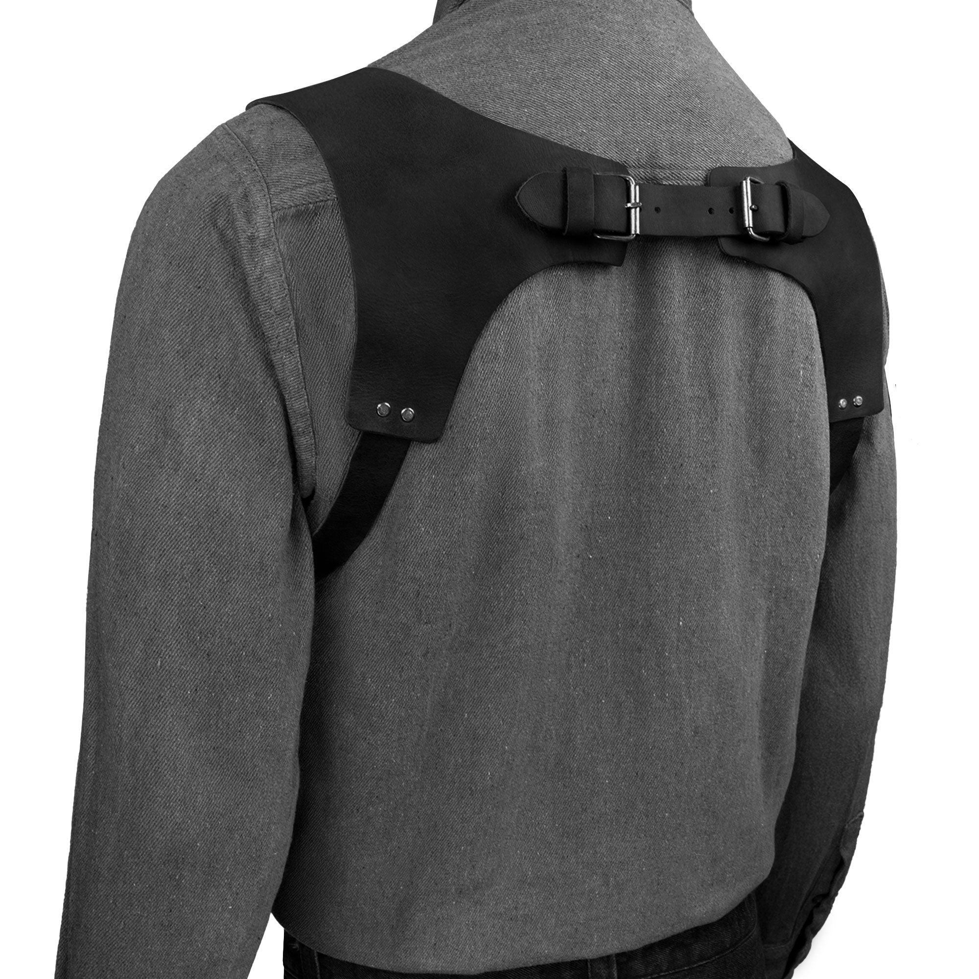 Back view of black Renaissance Suspenders by Hide & Drink, featuring strong leather construction. These back support harness for men are designed for groomsmen and best men, showcasing artisan quality with hand cut and sewn techniques.