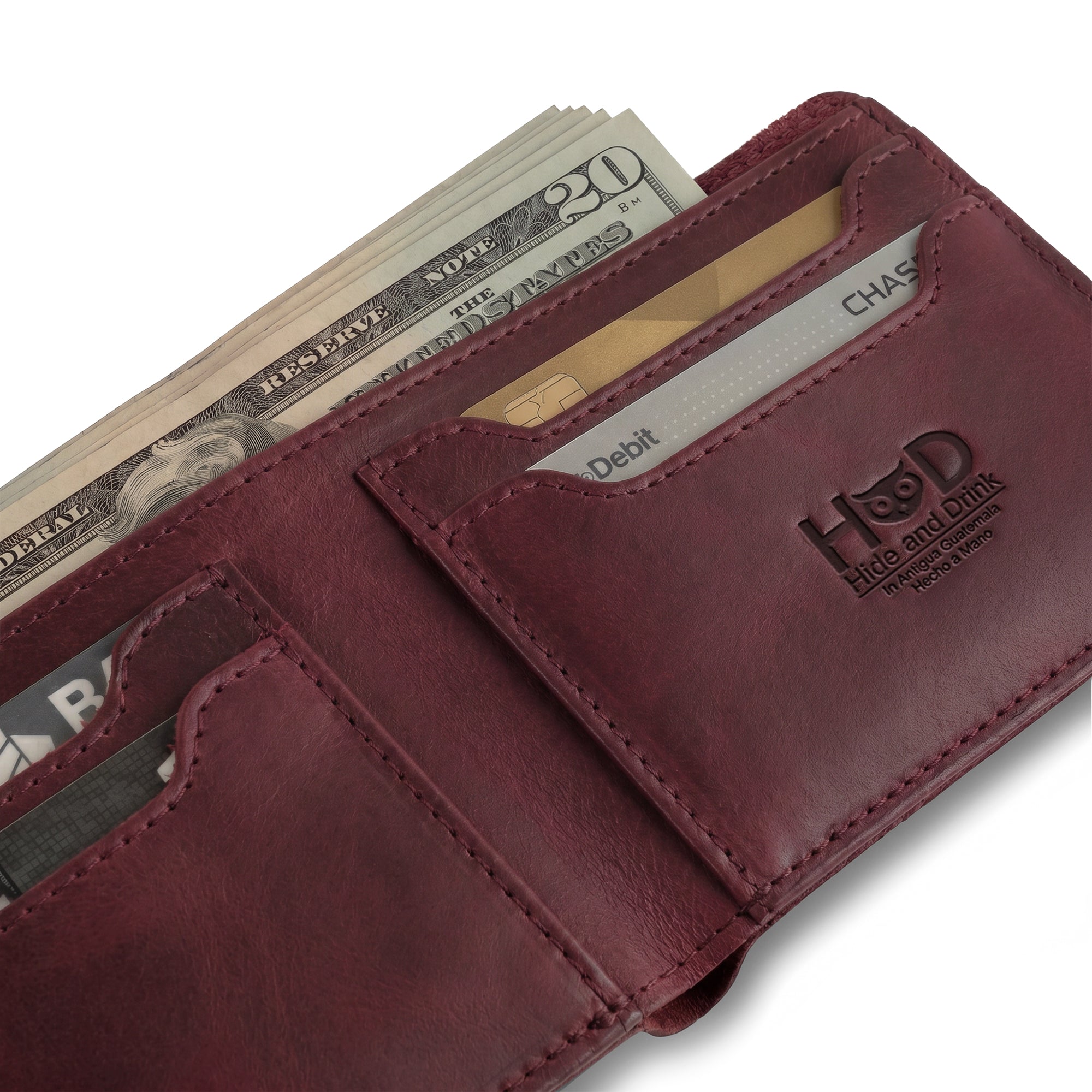 Classic Wallet in dark brown from Hide & Drink, with visible stitching details and a clean finish. This Classic Bifold Wallet serves as a reliable storage case for identification, made from premium Full Grain Leather. Perfect for travel, it showcases artisan craftsmanship through small batch production, hand cut and sewn in La Antigua Guatemala & Oaxaca Mexico.