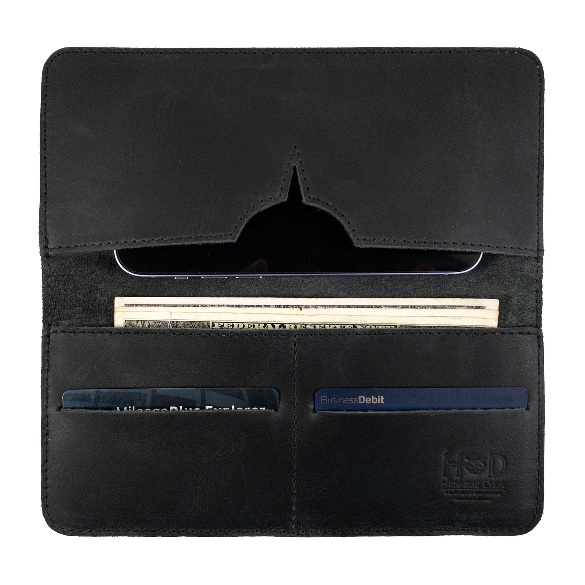 Detailed interior view of the black bifold wallet for cellphone by Hide & Drink, showcasing card and cash slots. This functional Bifold Wallet for Cellphone combines practicality with elegance in Full Grain Leather. Experience the high-quality artisan design made through small batch production in La Antigua Guatemala & Oaxaca Mexico.