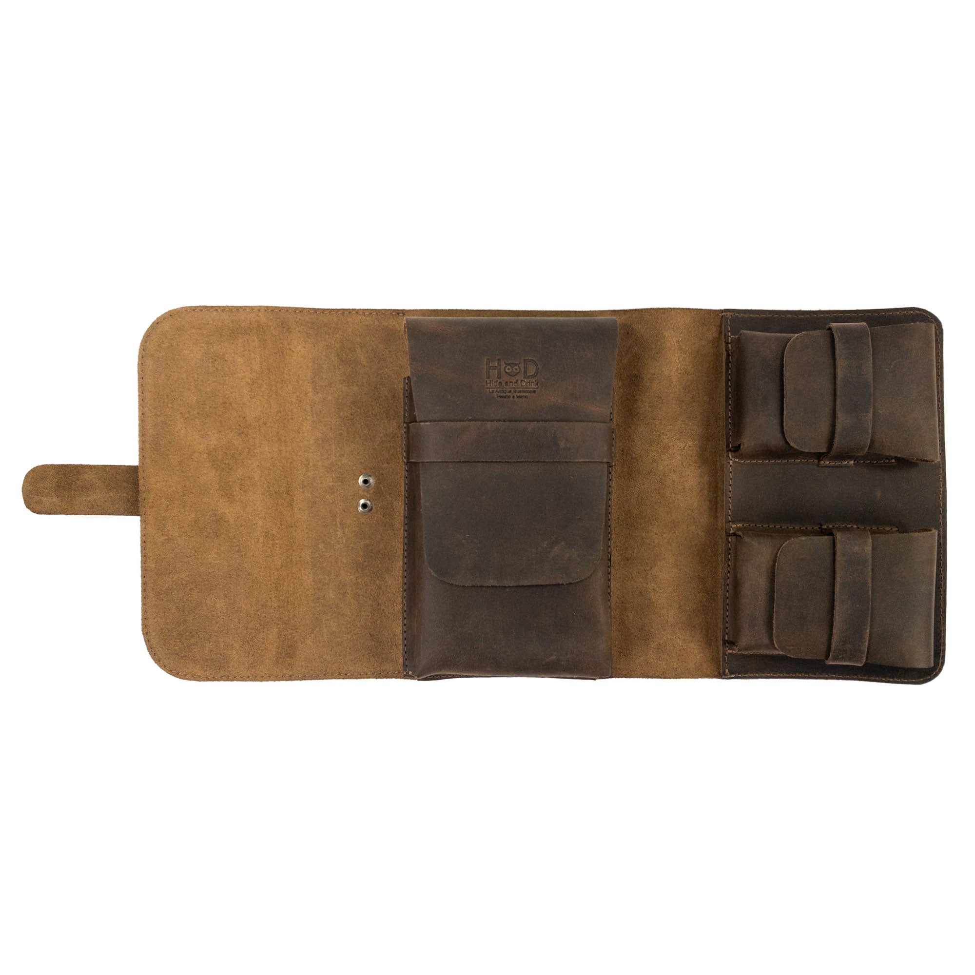 Open interior of the Triple Cigar Case by Hide & Drink, displaying slots for cigars and compartments for accessories. Made from full grain leather, this rustic tobacco pouch is hand cut and hand sewn, emphasizing artisan craftsmanship.