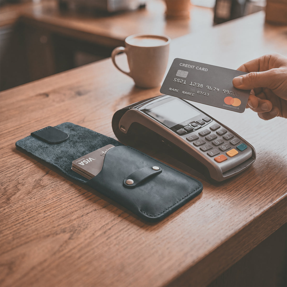 Hide & Drink Slim Card Holder shown upright, sleek and stylish design made from full grain leather. Perfect for holding up to 4 cards plus folded bills, this wallet is lovingly crafted by artisans in La Antigua Guatemala.