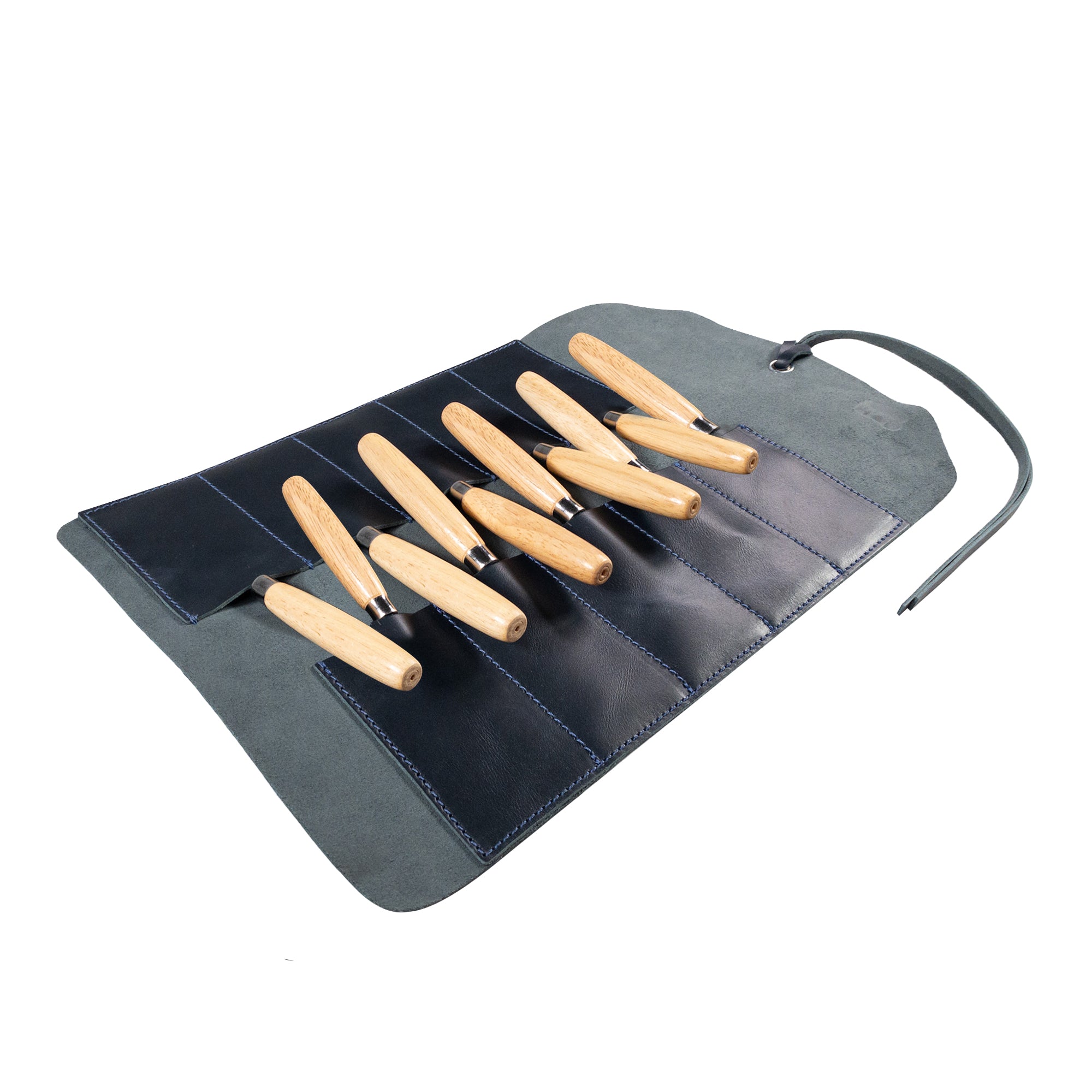 Hide & Drink Tool Roll introduces a robust small tool roll-up bag with 10 slots, made from premium full grain leather. Perfectly designed as a portable carry-on pouch for woodworking tools, it is suitable for any workshop storage setup. Handmade by artisans in La Antigua Guatemala & Oaxaca Mexico, underlining quality craftsmanship.