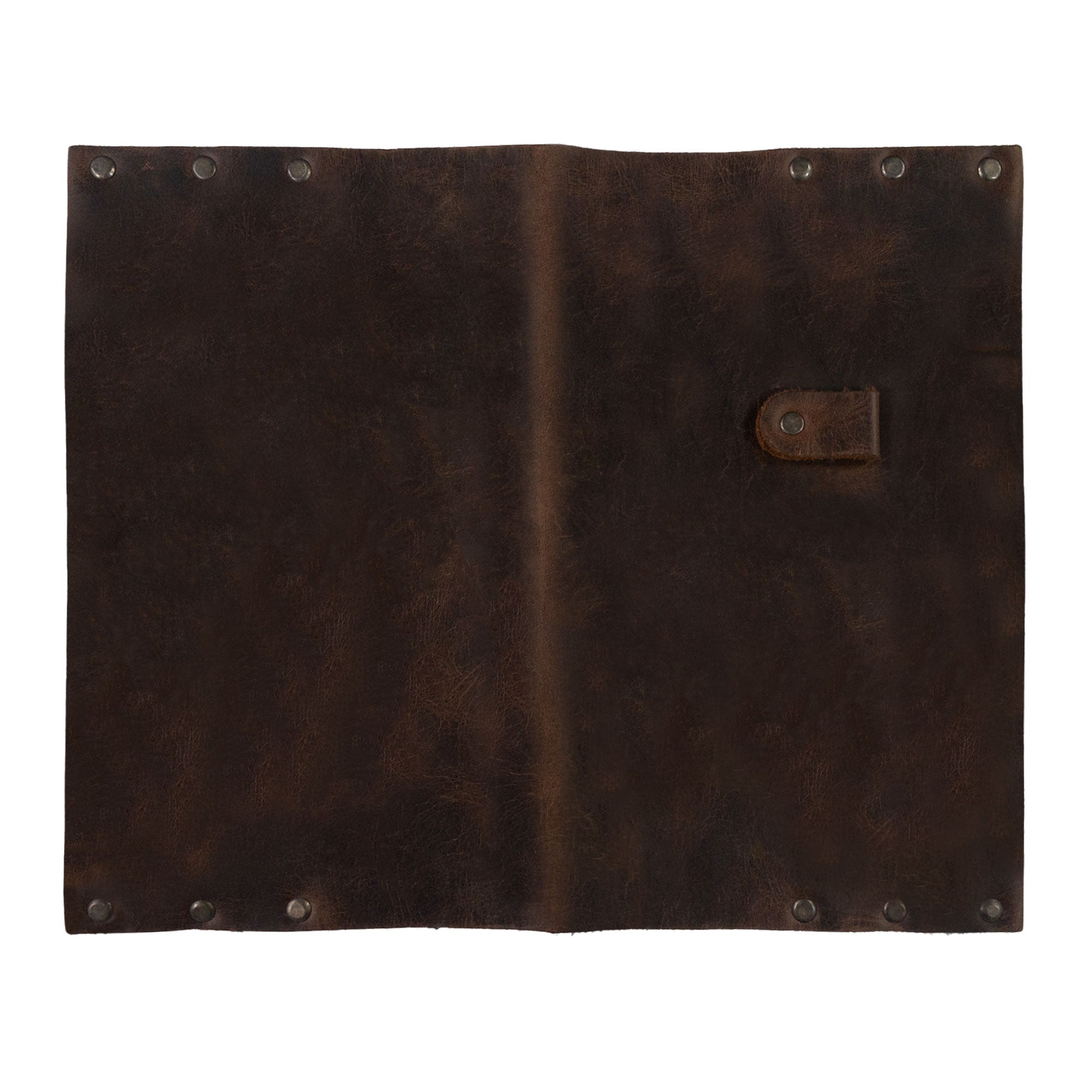 Hide & Drink's Riveted Journal Cover (5 x 8.50 in.) (Notebook Not Included) displayed open, showcasing a classic sleeve design in vintage style full grain leather. This handmade product reflects artisan skill with its hand cut and hand sewn features, marketed through small batch production and fire branding by artisans in La Antigua Guatemala & Oaxaca Mexico.
