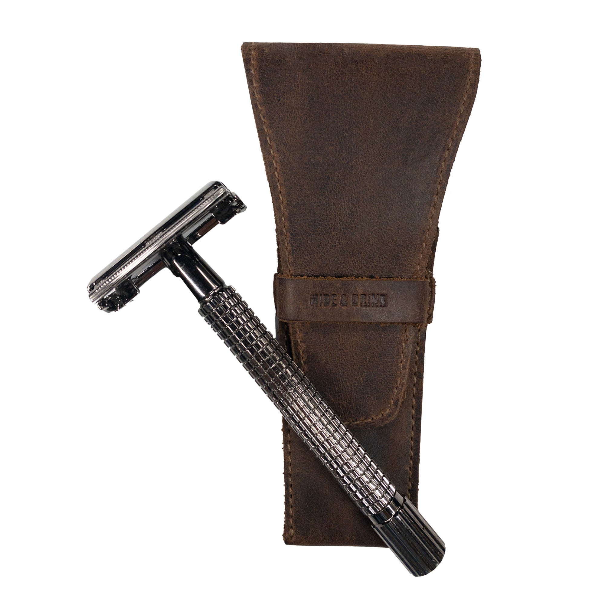 Safety Razor Case by Hide & Drink with a sleek razor included, made from premium Full Grain Leather. This handmade piece is an essential for personal care, showcasing small batch production from skilled artisans in La Antigua Guatemala.