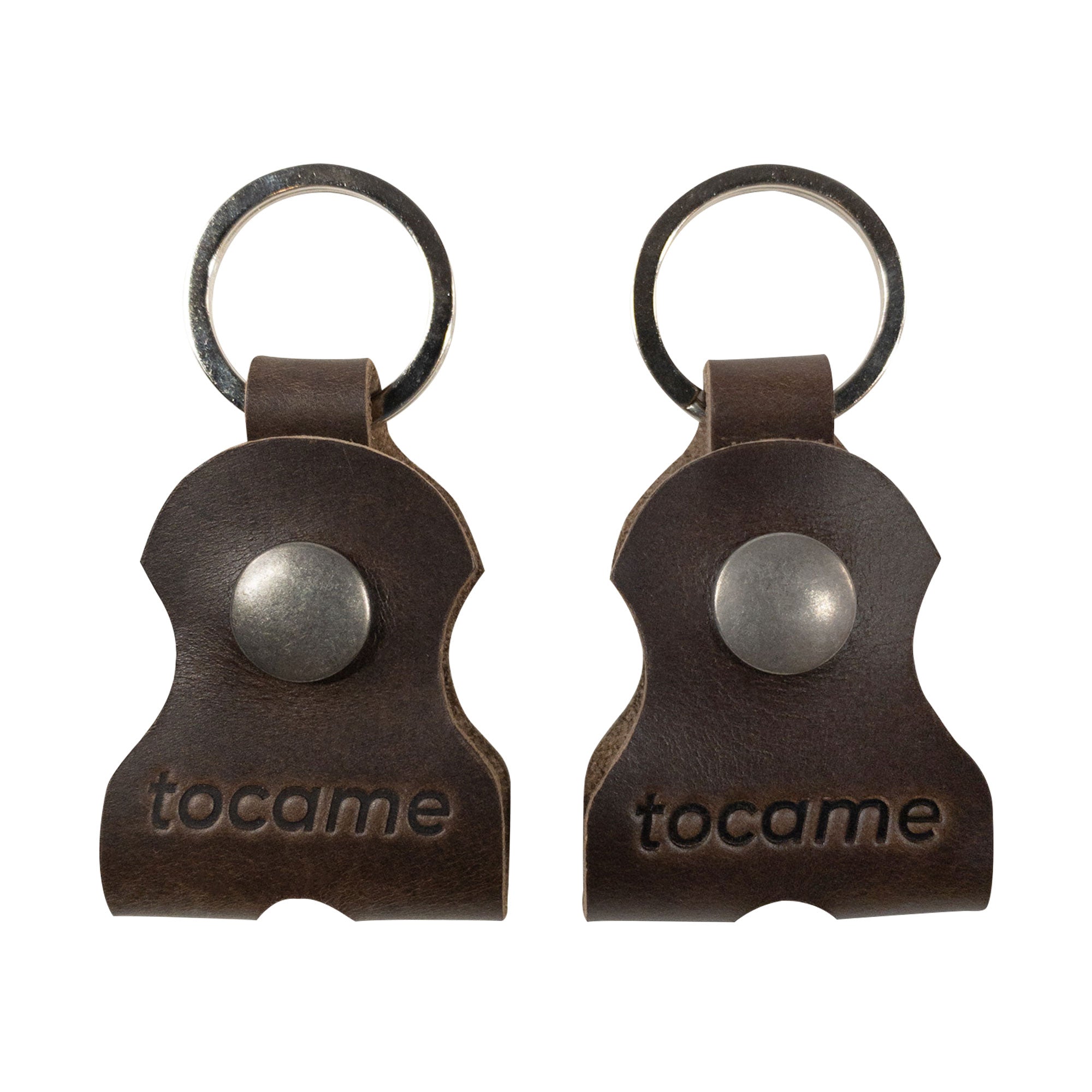 Two keychains from tocame, highlighting the Set of 2 Keychains for Drum Tunners (Not Included). Designed as a key organizer, these classic keyrings are ideal for musicians. Made from sturdy full grain leather, they show off artisan craftsmanship, hand cut and hand sewn, embodying the essence of handmade goods from La Antigua Guatemala & Oaxaca Mexico.