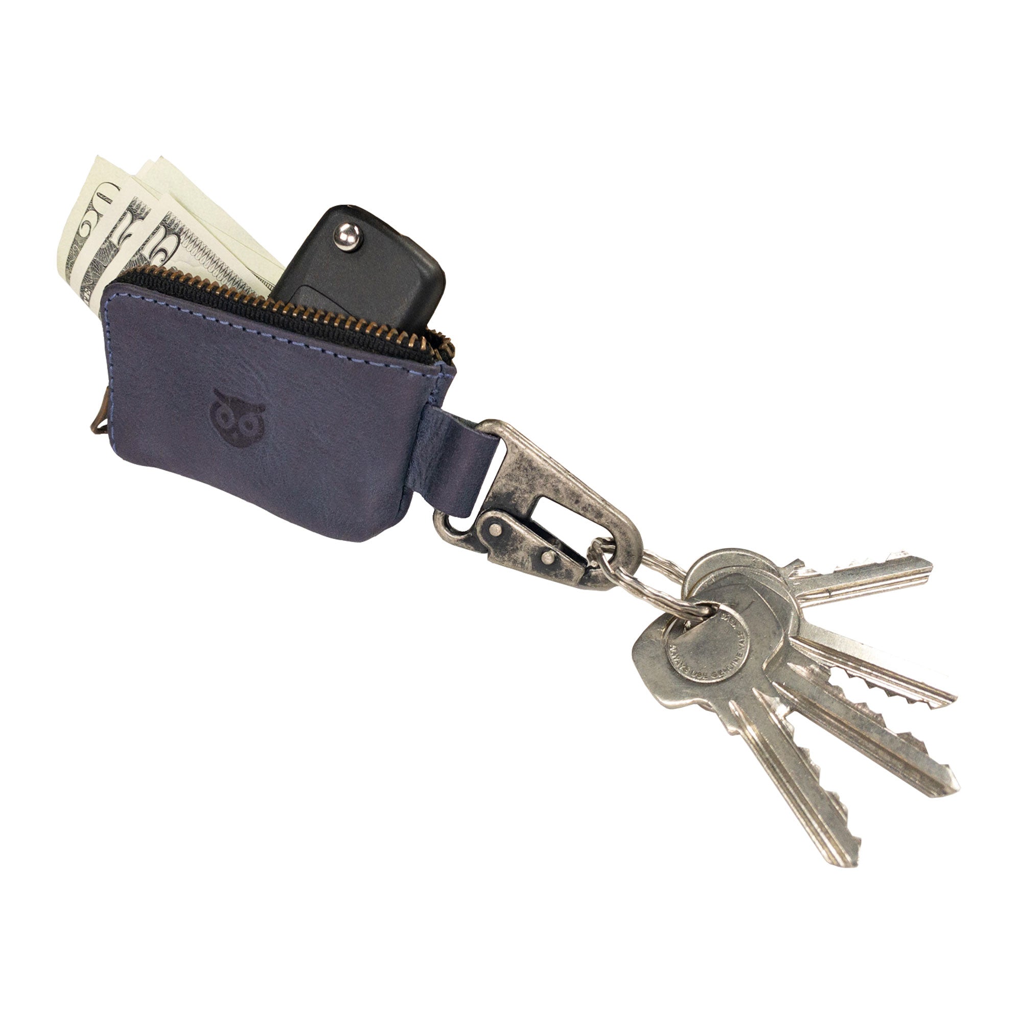 Hide & Drink Car Key Holder featuring a rustic leather finish, with keys and cash visible inside, exemplifying its versatility as a storage solution for charging cables, memory cards, and flash drives, secured by a Nickel Metal Clasp. StockyardX, Small Batch Production, Hand Cut, Hand Sewn, Fire Branded, Artisan, Handmade in La Antigua Guatemala & Oaxaca Mexico.