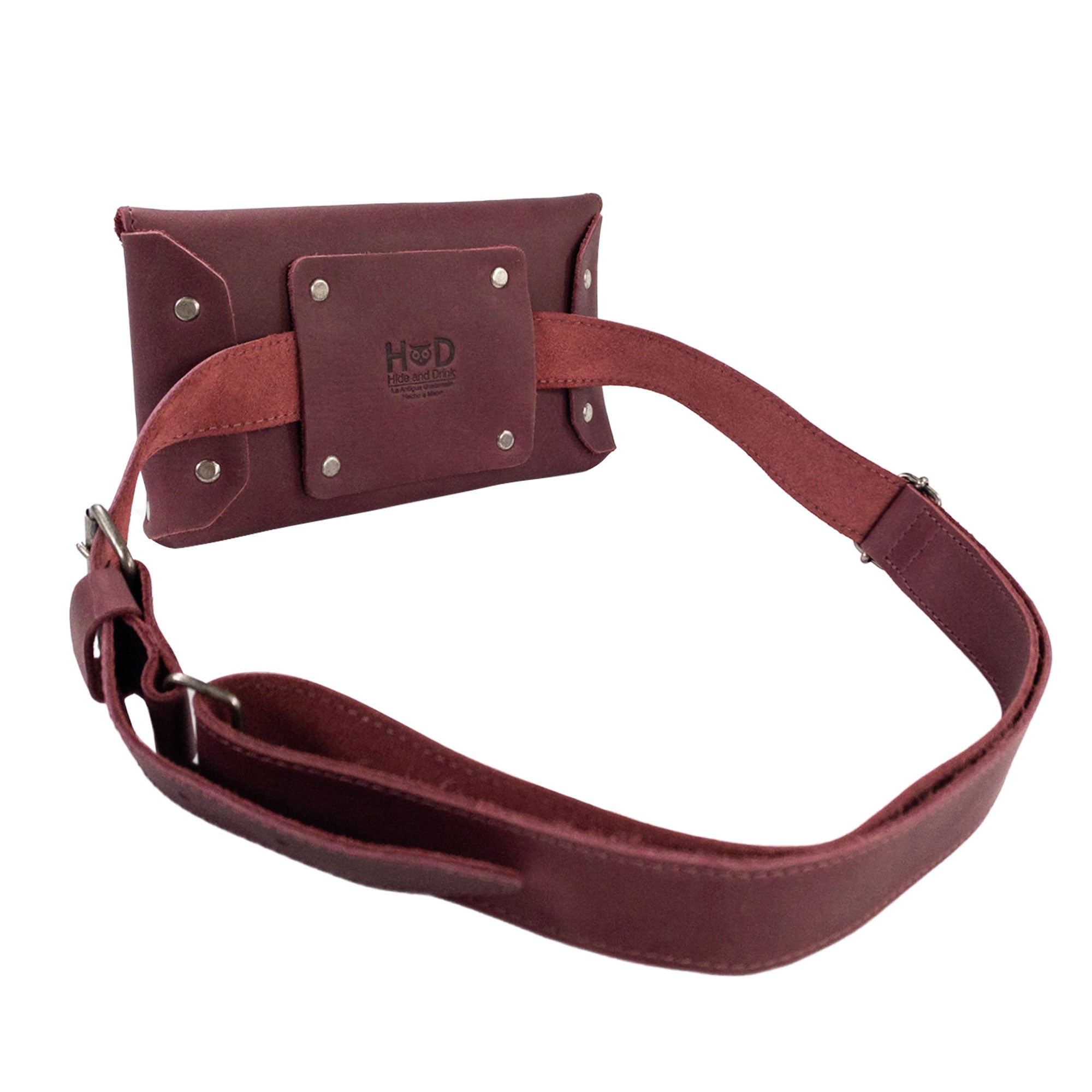 Back view of Hide & Drink's Fancy Fanny Pack, emphasizing quality leather and secure strap design. This full grain leather waist pouch stands out as both a vintage purse and practical phone holder.