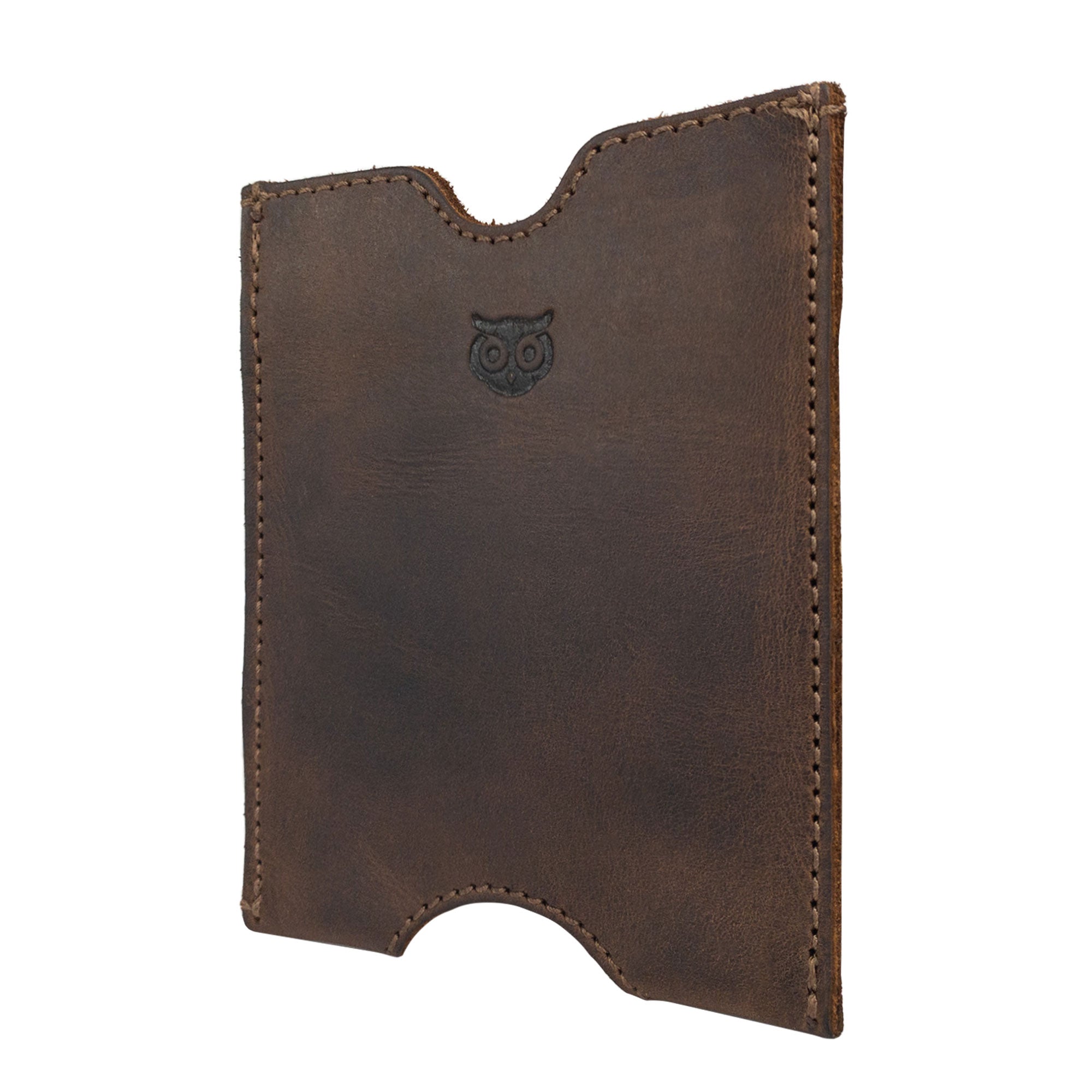 Side view of the Hide & Drink Passport Sleeve, showcasing its elegant design and quality construction. This handmade Travel Passport Pocket Sleeve is made from Full Grain Leather and features artisan craftsmanship like fire branding.