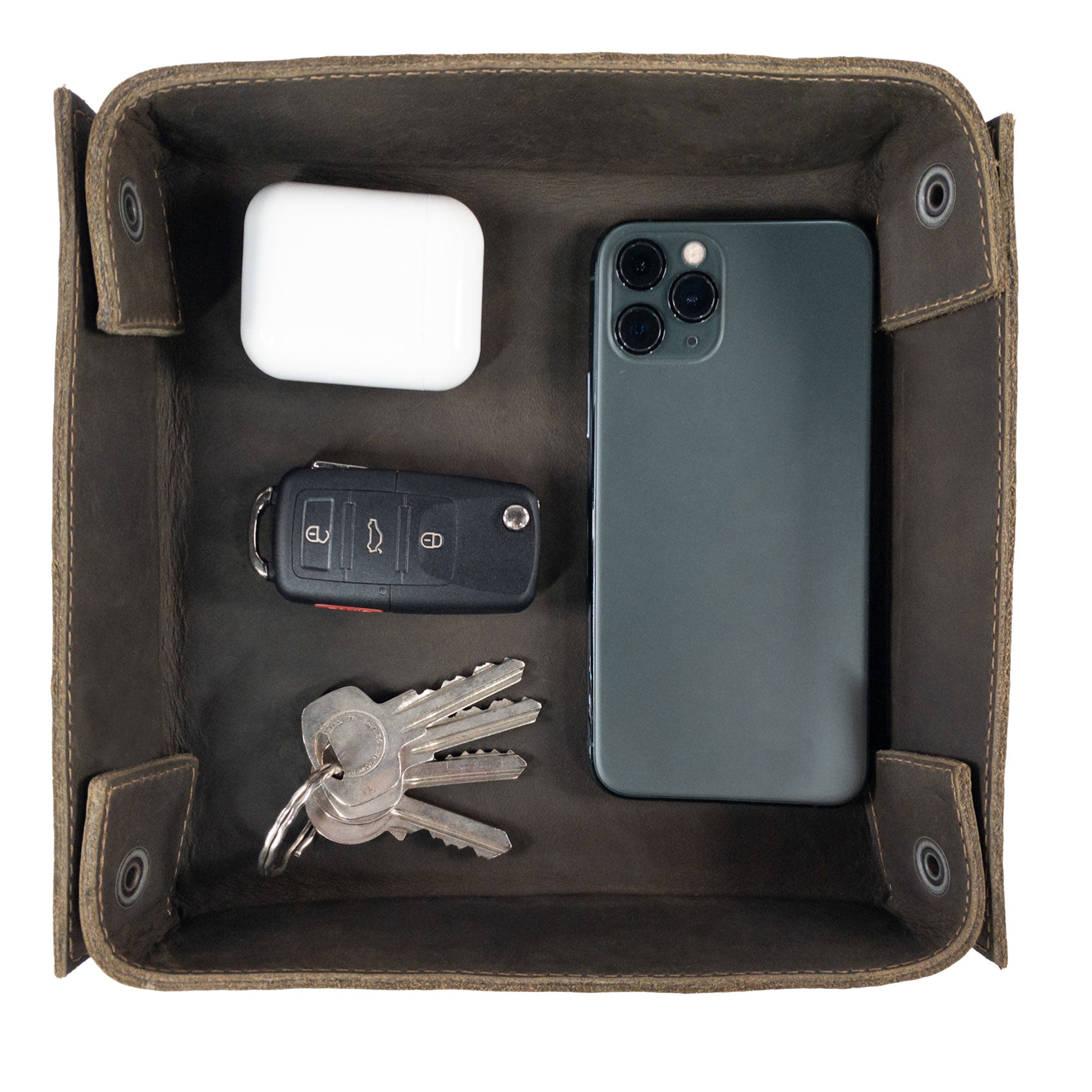 Hide & Drink Jumbo Tray, a durable catchall tray made from full grain leather for organizing keys and coins. This artisan-crafted item emphasizes small batch production from La Antigua Guatemala.