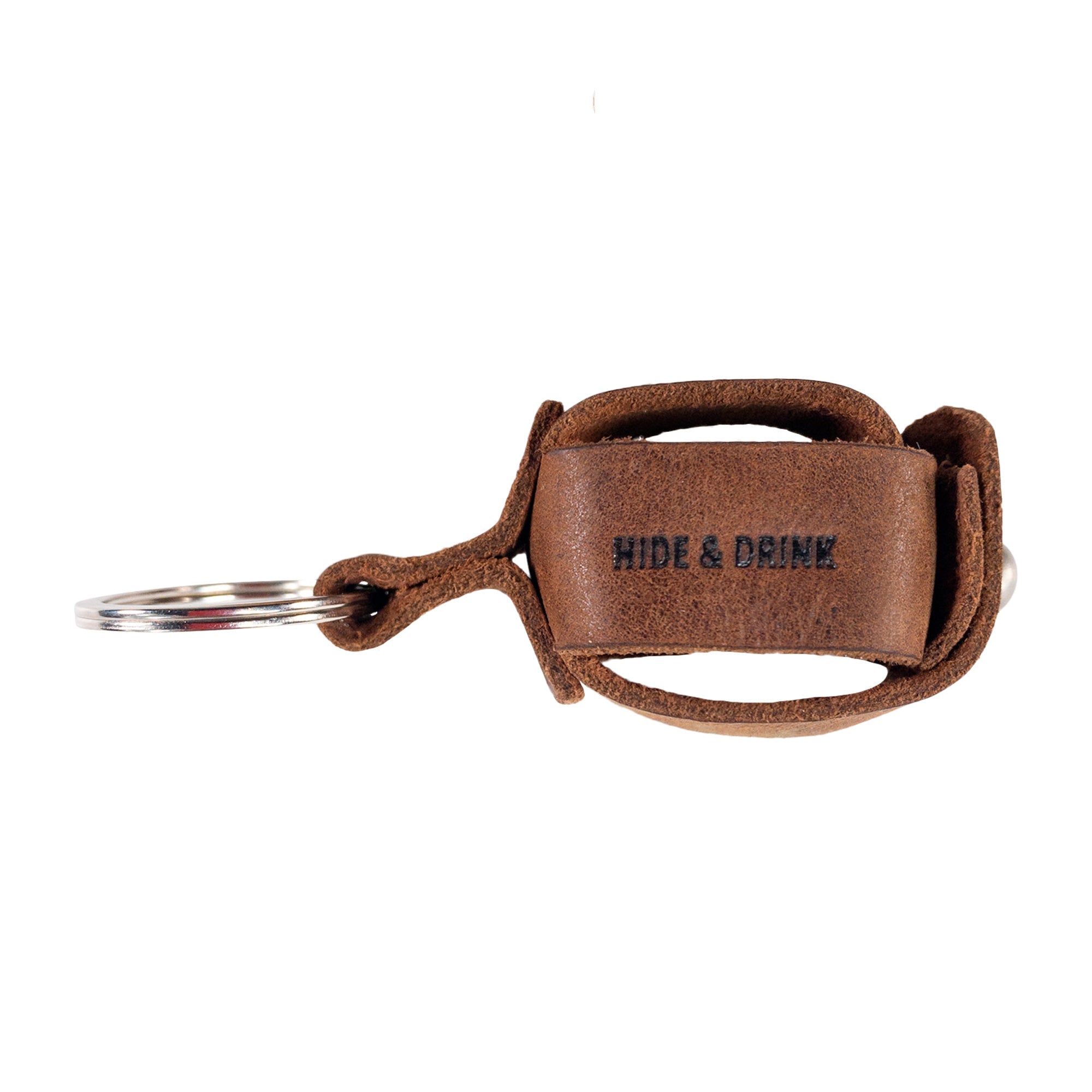 Front view of the Hide & Drink Measuring Tape Holder Keychain, emphasizing the unique design for holding measuring tape (Tape not Included). Crafted from high-quality Full Grain Leather, this Key Ring Organizer is an ideal choice for tailor accessories, celebrated for its artisan quality through small batch production, hand cut, and hand sewn techniques, made in La Antigua Guatemala & Oaxaca Mexico.