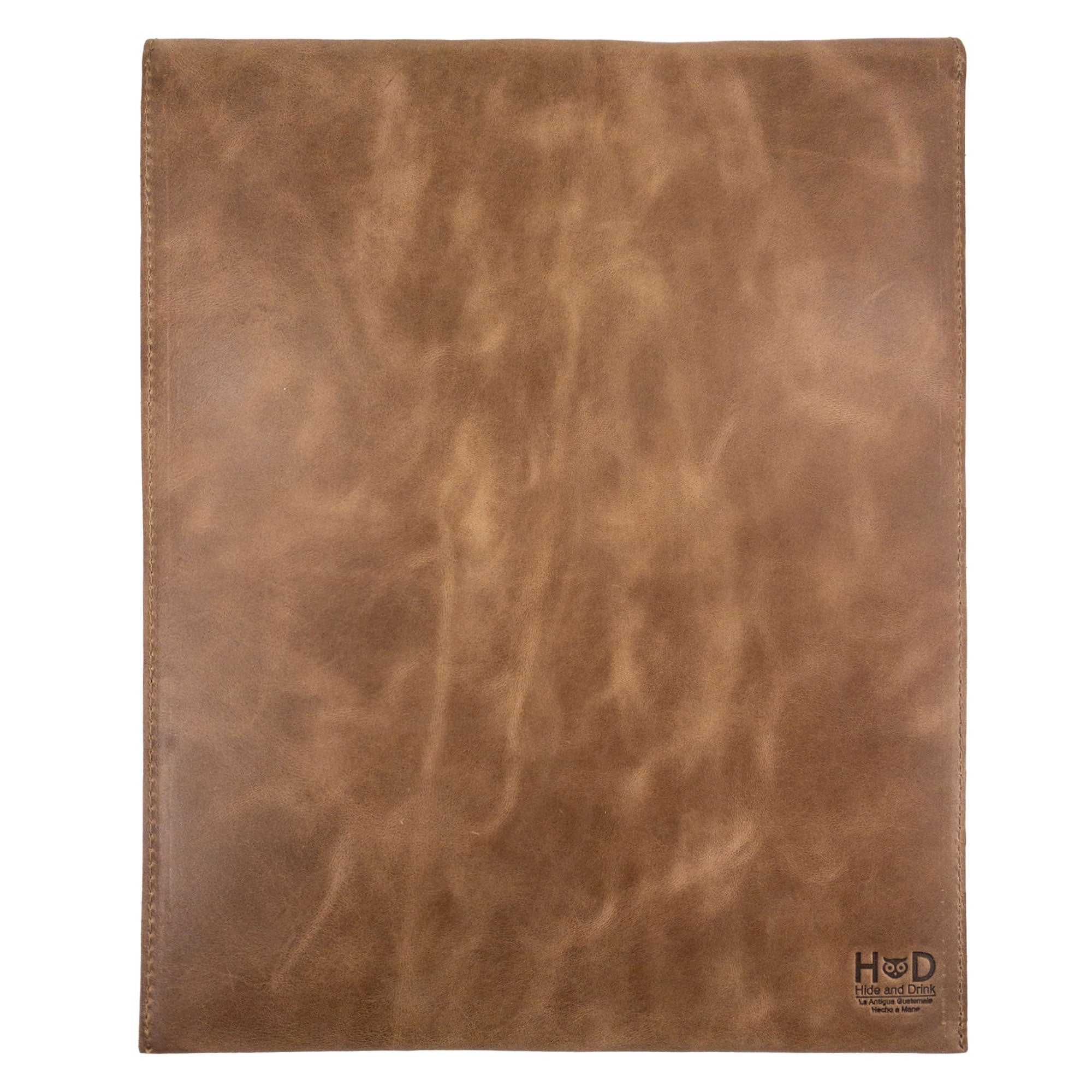 Distinctive Mailing Envelope Folder by Hide & Drink, showcasing its artisanal quality. This Mailing Envelope Document Holder offers a sophisticated office accessory, crafted from Full Grain Leather in Oaxaca Mexico.