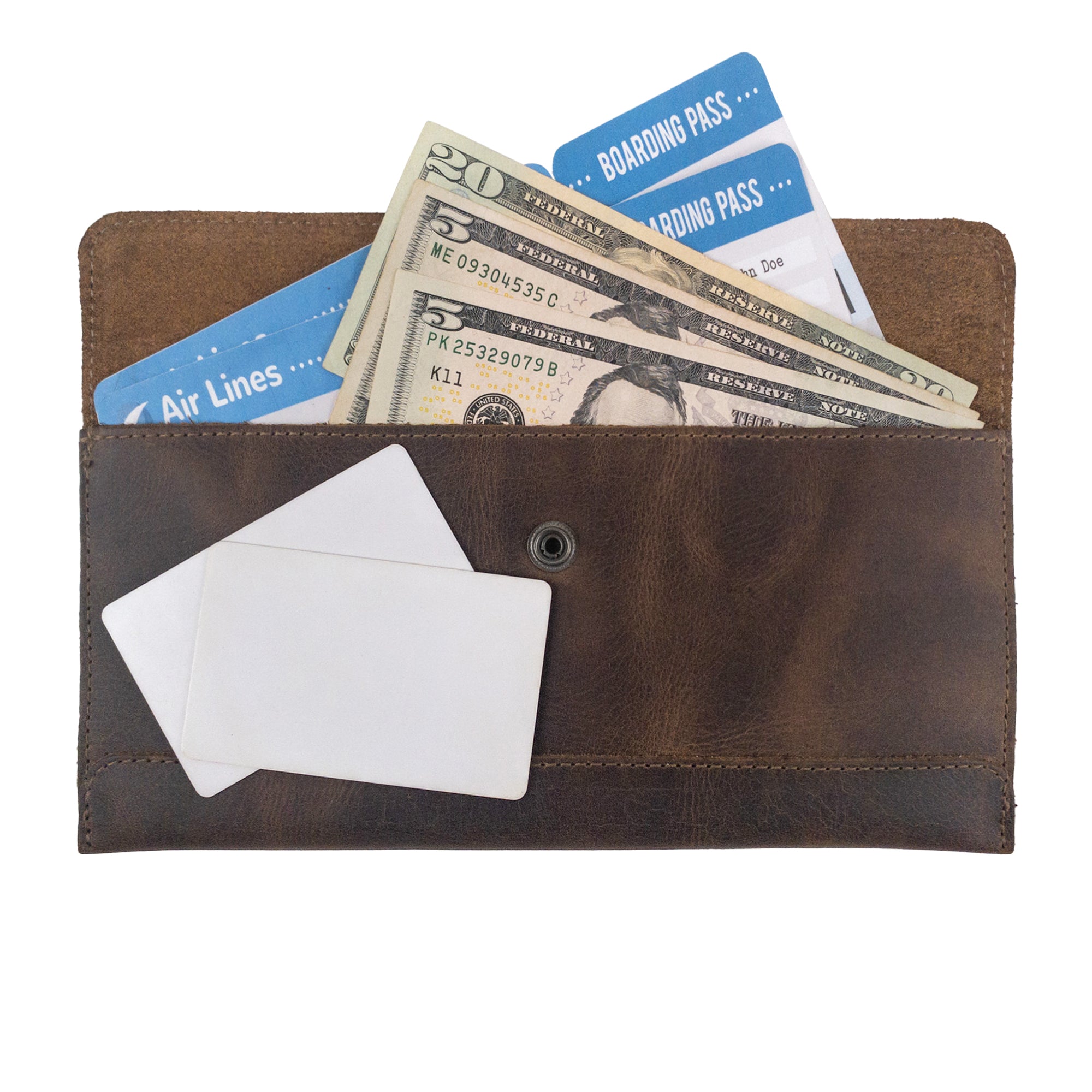 The interior of Hide & Drink's Travel Hand Wallet shows its utility with cash and cards, representing the quality of Full Grain Leather. A perfect Travel Wallet that reflects Small Batch Production and is handmade in La Antigua Guatemala & Oaxaca Mexico.