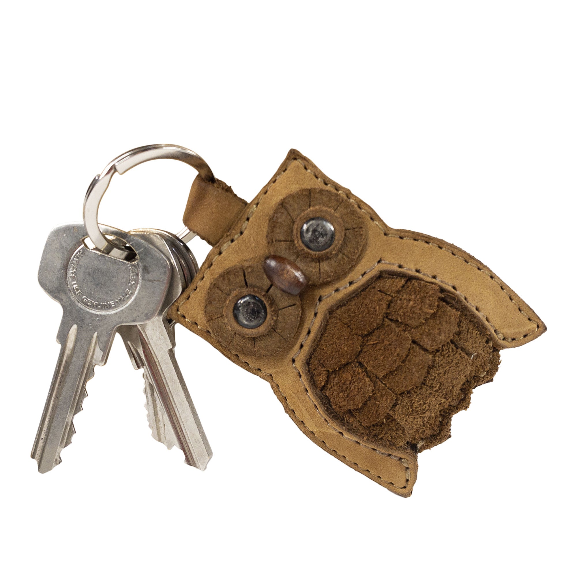 Owl Critter Key Chain by Hide & Drink, displaying its unique features and craftsmanship. This playful Animal Key Ring Holder is crafted from durable Full Grain Leather, ideal for adding flair to a key collection. Handmade in La Antigua Guatemala & Oaxaca Mexico.