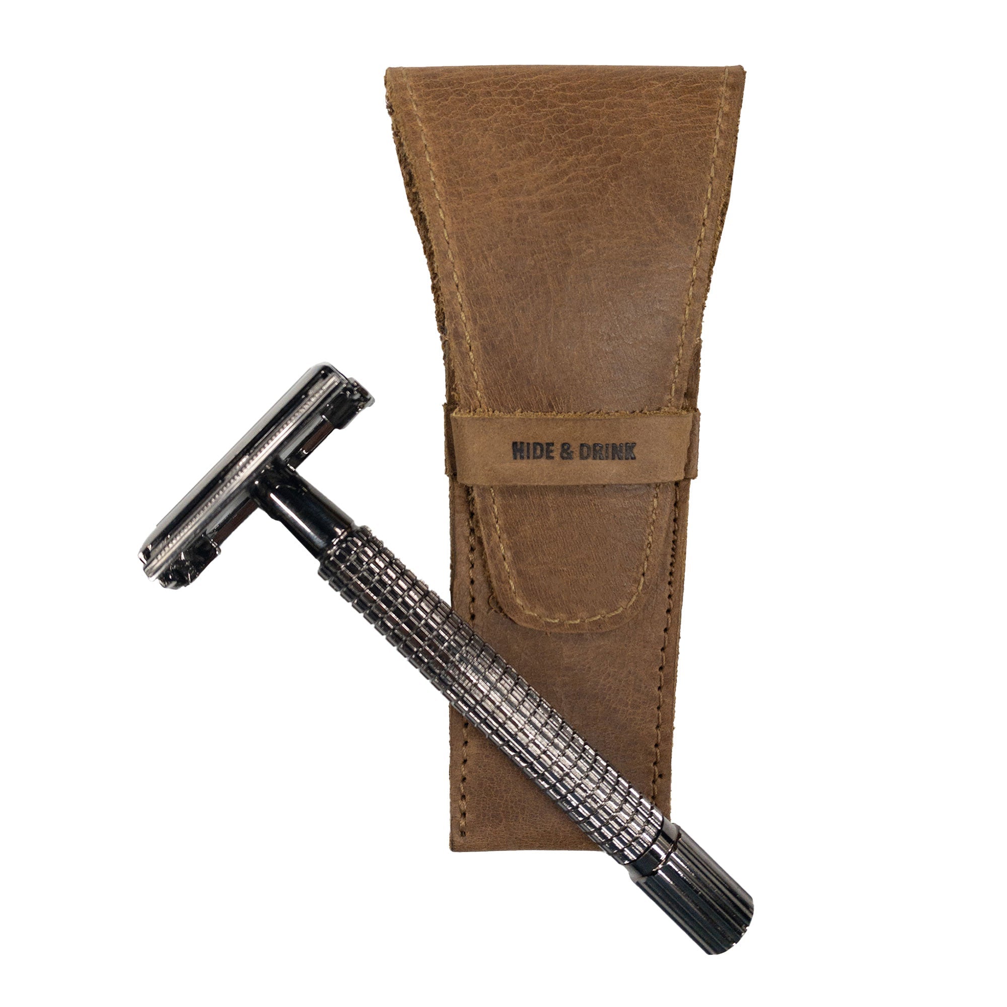 Safety Razor Case by Hide & Drink, captured to show its form and interior lining, ideal for razor care. This Full Grain Leather case represents high-quality artisan skills and is perfect for shaving enthusiasts.