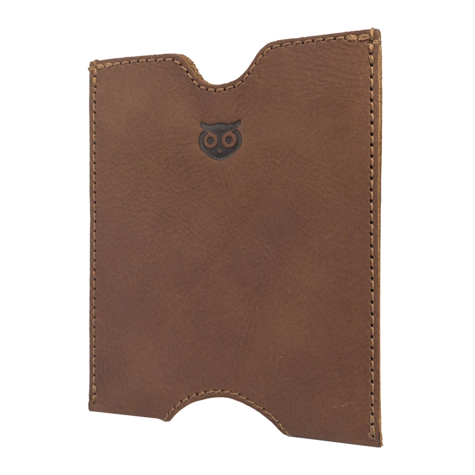 Side view of the Hide & Drink Passport Sleeve, displaying its stylish handcrafted design and premium quality. This full grain leather travel passport pocket sleeve is essential for your travels. Features tags: Travel Passport Pocket Sleeve, Full Grain Leather, StockyardX, Small Batch Production, Hand Cut, Hand Sewn, Fire Branded, Artisan, Handmade in La Antigua Guatemala & Oaxaca Mexico.