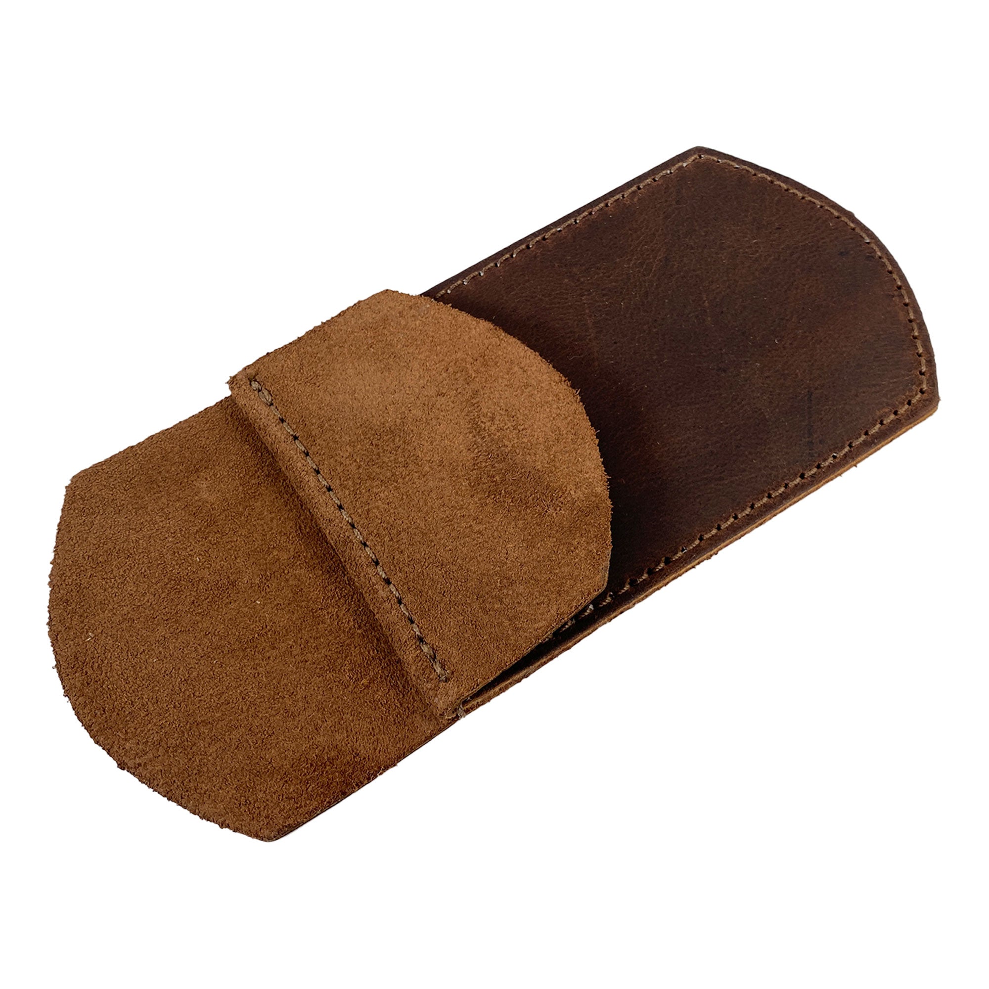 An opened view of the Heavy Duty Hide Pen Pocket, highlighting the soft suede flap and sturdy full grain leather backing. This handmade pen holder is stylish yet functional, making it the perfect pocket protector for shirts and lab coats, crafted by artisans in La Antigua Guatemala. A quality choice for those seeking office and work essentials from StockyardX.